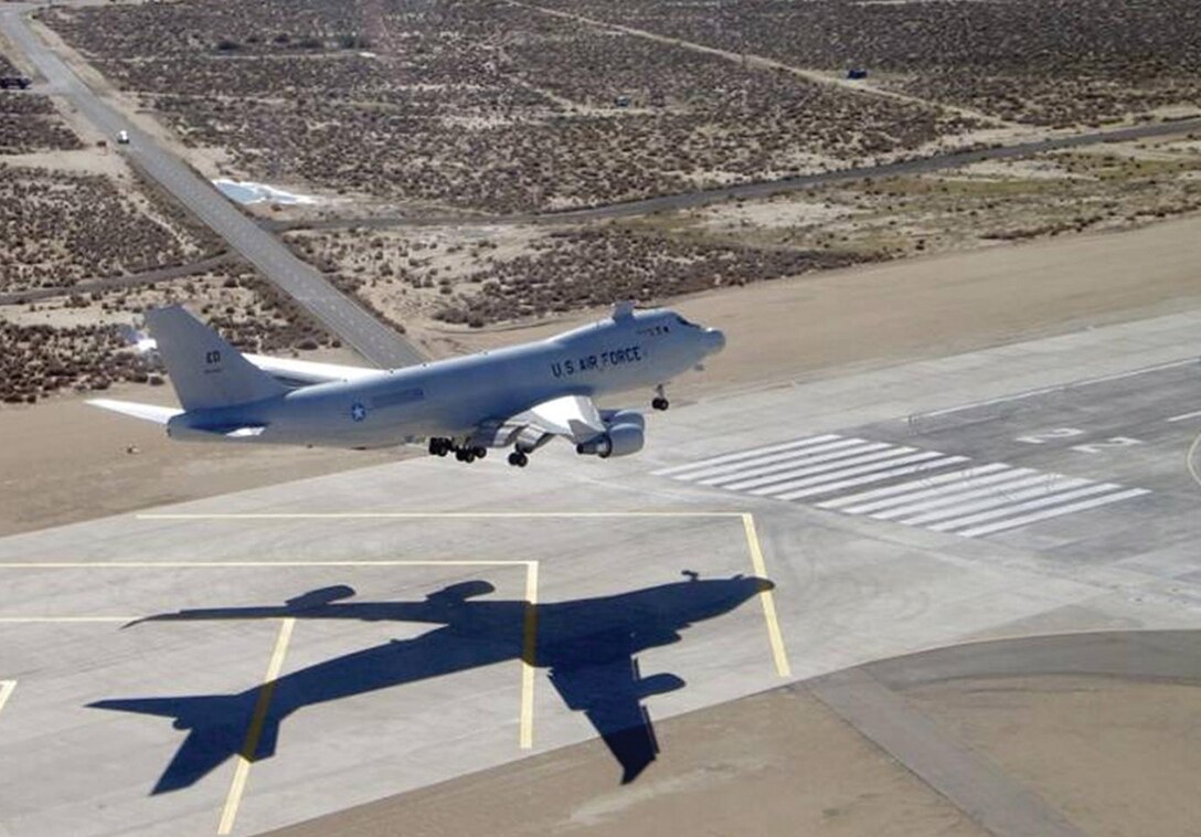 YAL-1A, a modified Boeing 747-400F known as the Airborne Laser, lands on Runway 22 here in its return to the Air Force Flight Test Center in December after undergoing modifications at Boeing's facilities in Wichita, Kan. Since the aircraft's return, the Airborne Laser began a long-term test phase that includes the test firing of the aircraft's low-power lasers in flight for the first time. (Courtesy photo)