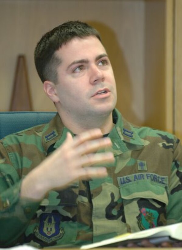 Chaplain (Capt.) J. Stephen Hicks leads Chapel Service during the December Unit Training Assembly.