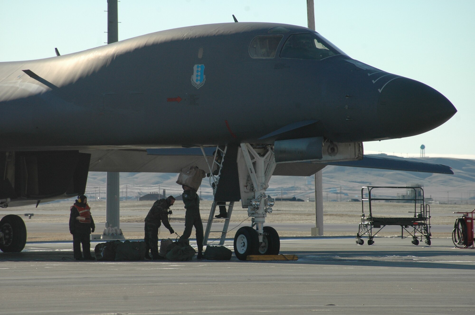 Ellsworth Airmen load a B-1 as the first part of the aviation package prepares to deploy to Southwest Asia. By the end of January, Ellsworth will send more than 400 members in support of the global war on terrorism. (U.S. Air Force photo/Airman 1st Class Kimberly Moore Limrick)