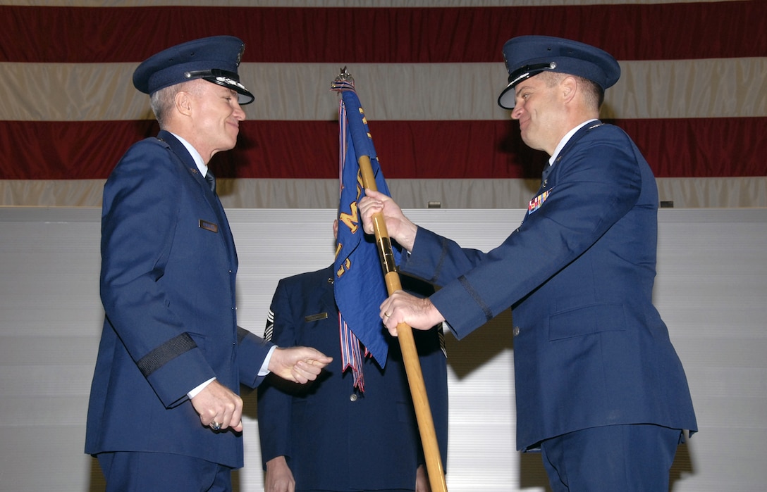 Col. James King Jr. accepts the 82nd Medical Group flag from Brig. Gen. Richard Devereaux, 82nd Training Wing commander, during a ceremony Jan. 17. Colonel King replaces Col. Michael Miller as the medical group commander. (U.S. Air Force photo/Sandy Wassenmiller)