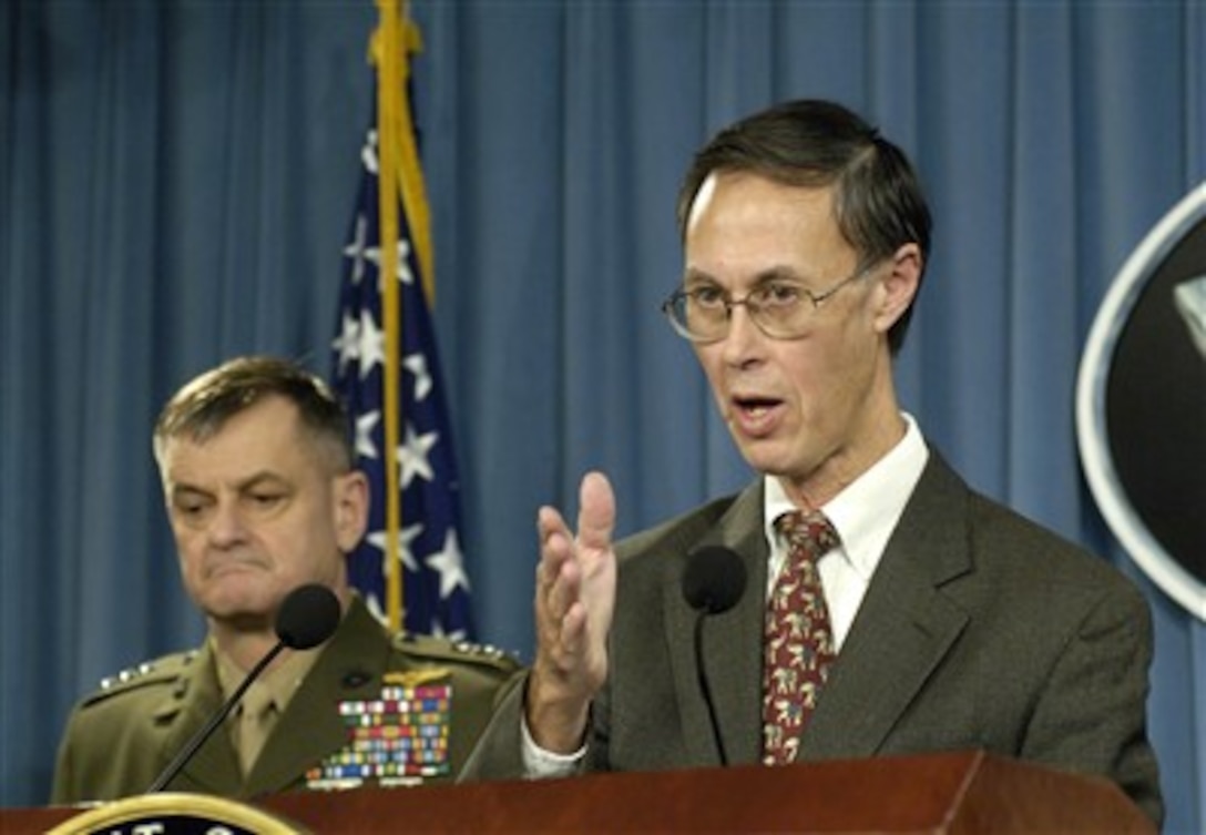 Under Secretary of Defense for Personnel and Readiness David Chu (right) briefs reporters in the Pentagon on new policies regarding the frequency and length of involuntary mobilizations for National Guard and Reserve units in the Pentagon on Jan. 19, 2007.  Chu was joined for the briefing by Deputy Commandant for Programs and Resources Lt. Gen. Emerson N. Gardner Jr. (left), U.S. Marine Corps, and Director of the Army's Force Development Office and Deputy Chief of Staff Lt. Gen. Stephen M. Speakes, U.S. Army.  