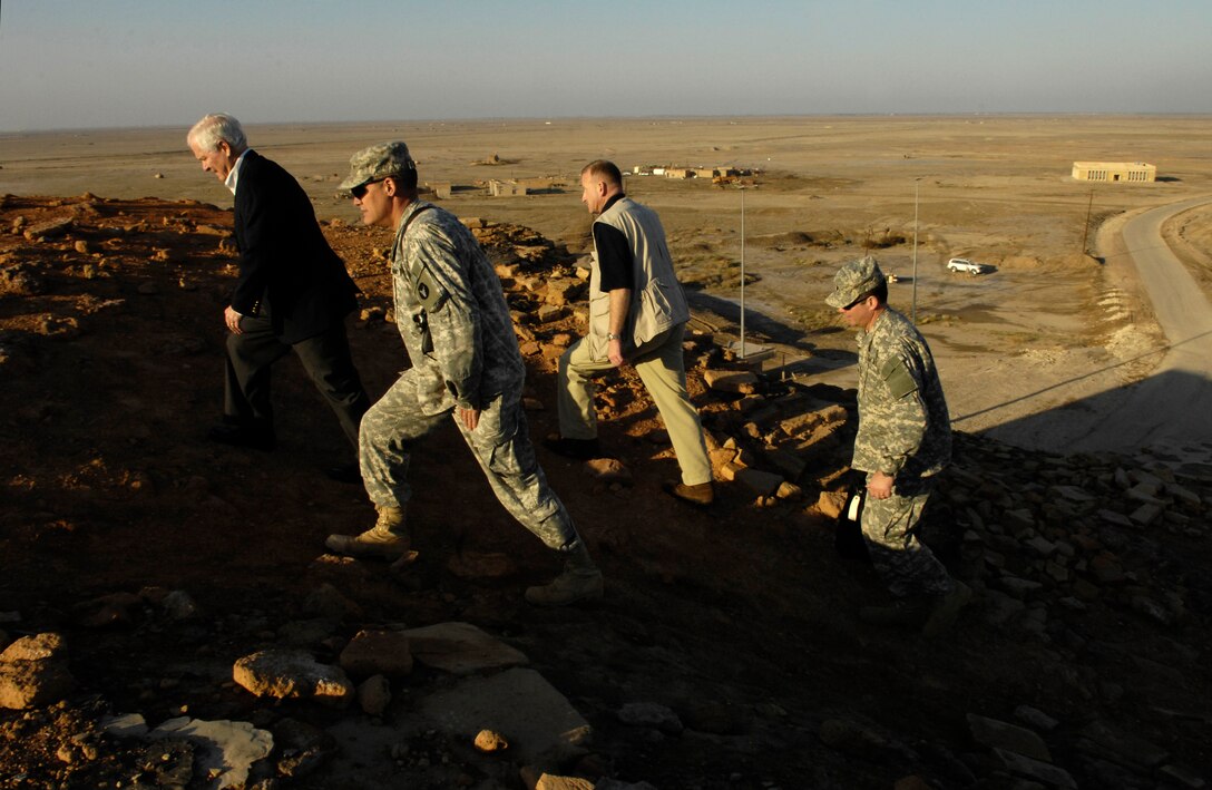 U.S. Defense Secretary Robert Gates receives a tour of the Great Ziggurat of Ur, Iraq, Jan. 19, 2007. The ziggurat was believed to be a place of worship, dedicated to the moon god Nanna in the Sumerian city of Ur in ancient Mesopotamia