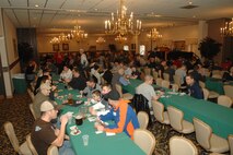 MINOT AIR FORCE BASE, N.D. -- Hundreds of Team Minot members packed the Jimmy Doolittle Center for the 42nd annual Sportsmen’s Feed here Jan. 21. This year’s gathering drew more than 260 people for an assortment of wild-game appetizers and entrees, games and tournaments like bingo and darts, and big-screen viewing of the National Football Conference and American Football Conference championship games. (U.S. Air Force photo by Airman 1st Class Christopher Boitz)