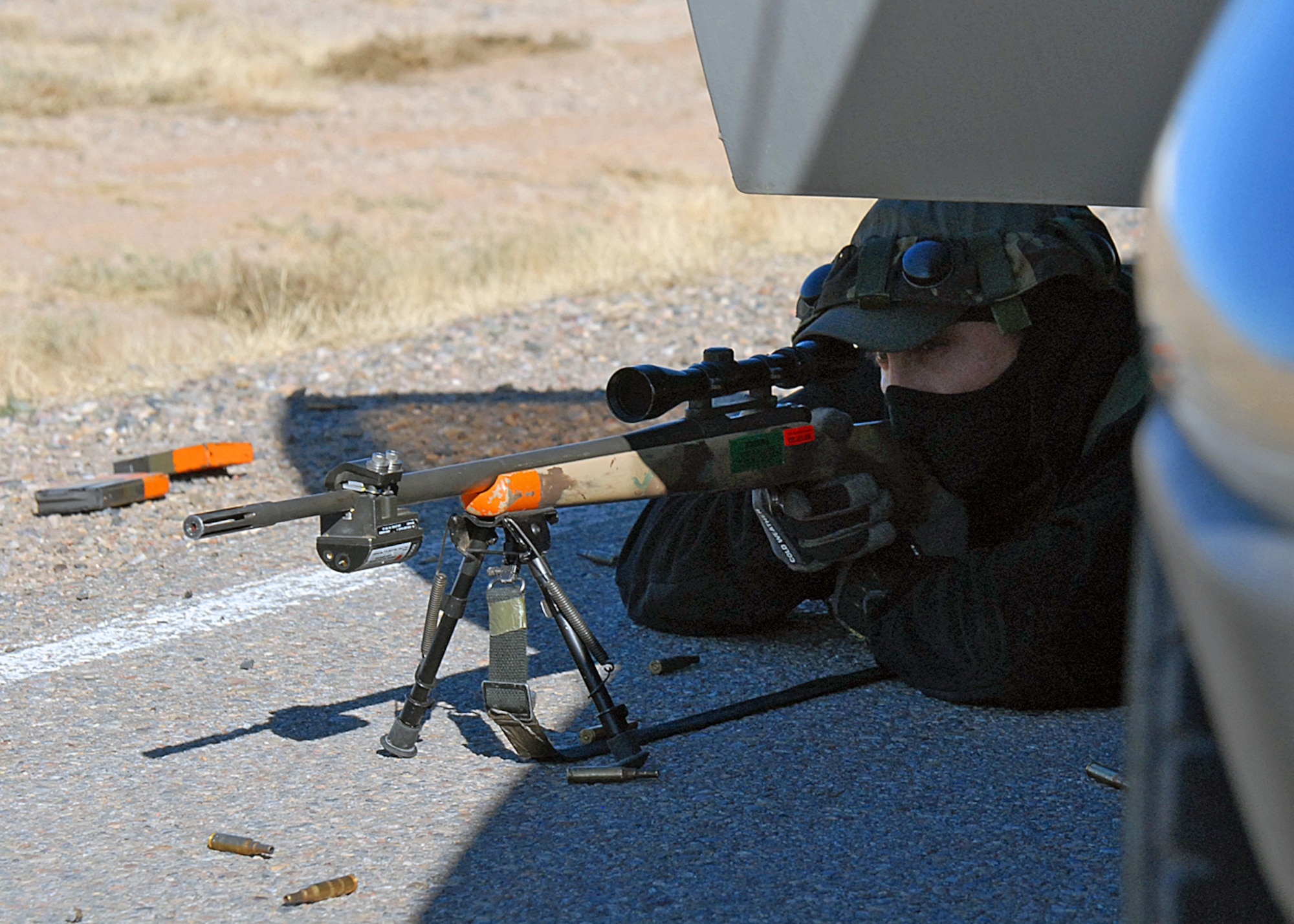 A sniper hides in a force protection exercise held by the 377th Security Forces Squadron here in preparation for the Nuclear Surety Inspection. The inspection begins Saturday and ends Jan. 26. U.S. Air Force Photo by Laurence Zankowski.