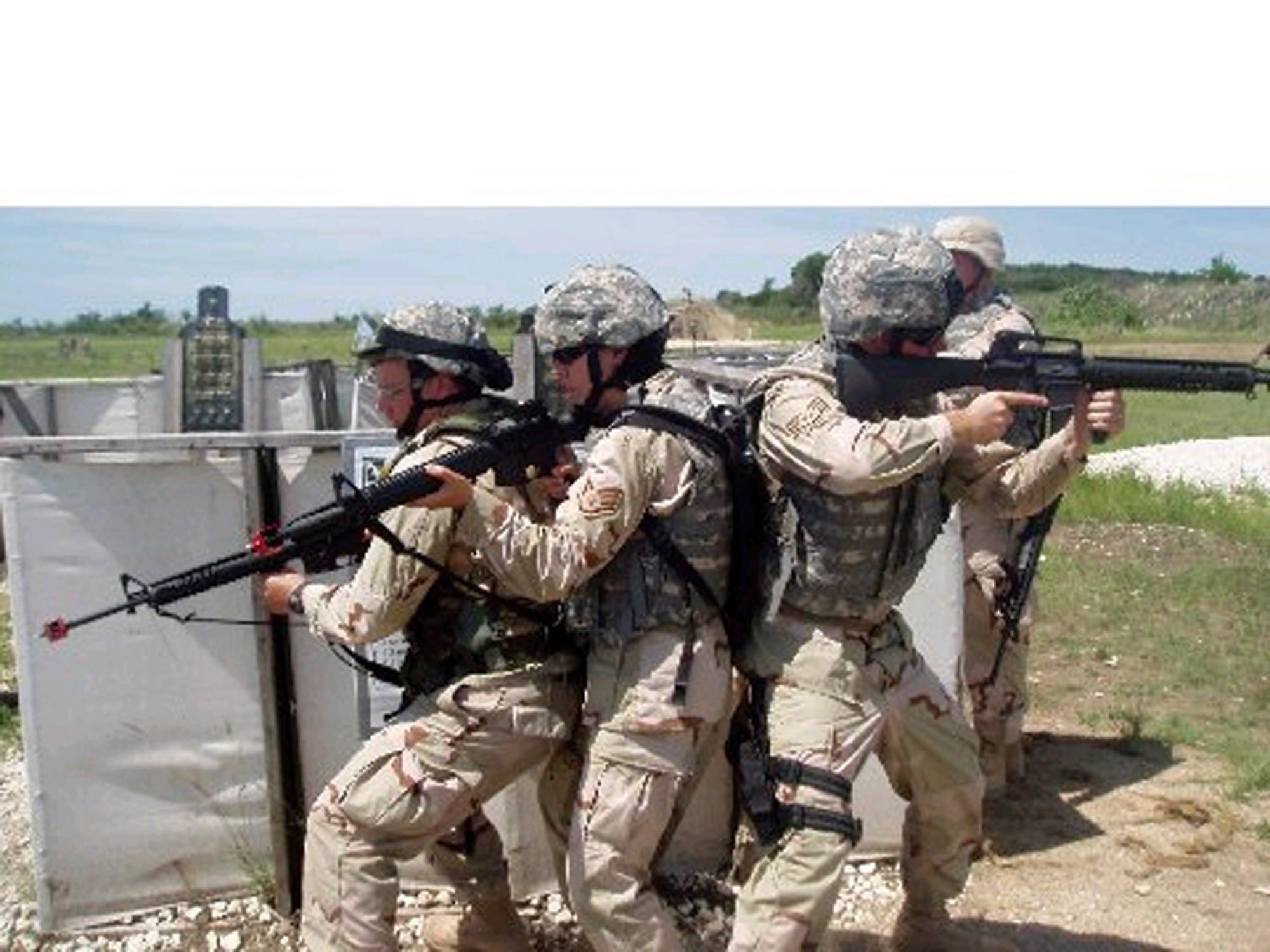 Airmen perform a room clearing drill at Fort Hood, Texas, as part of predeployment training. The Airmen are assigned to the  52nd Logistics Readiness Squadron from Spangdahlem Air Base, Germany. (Courtesy photo)