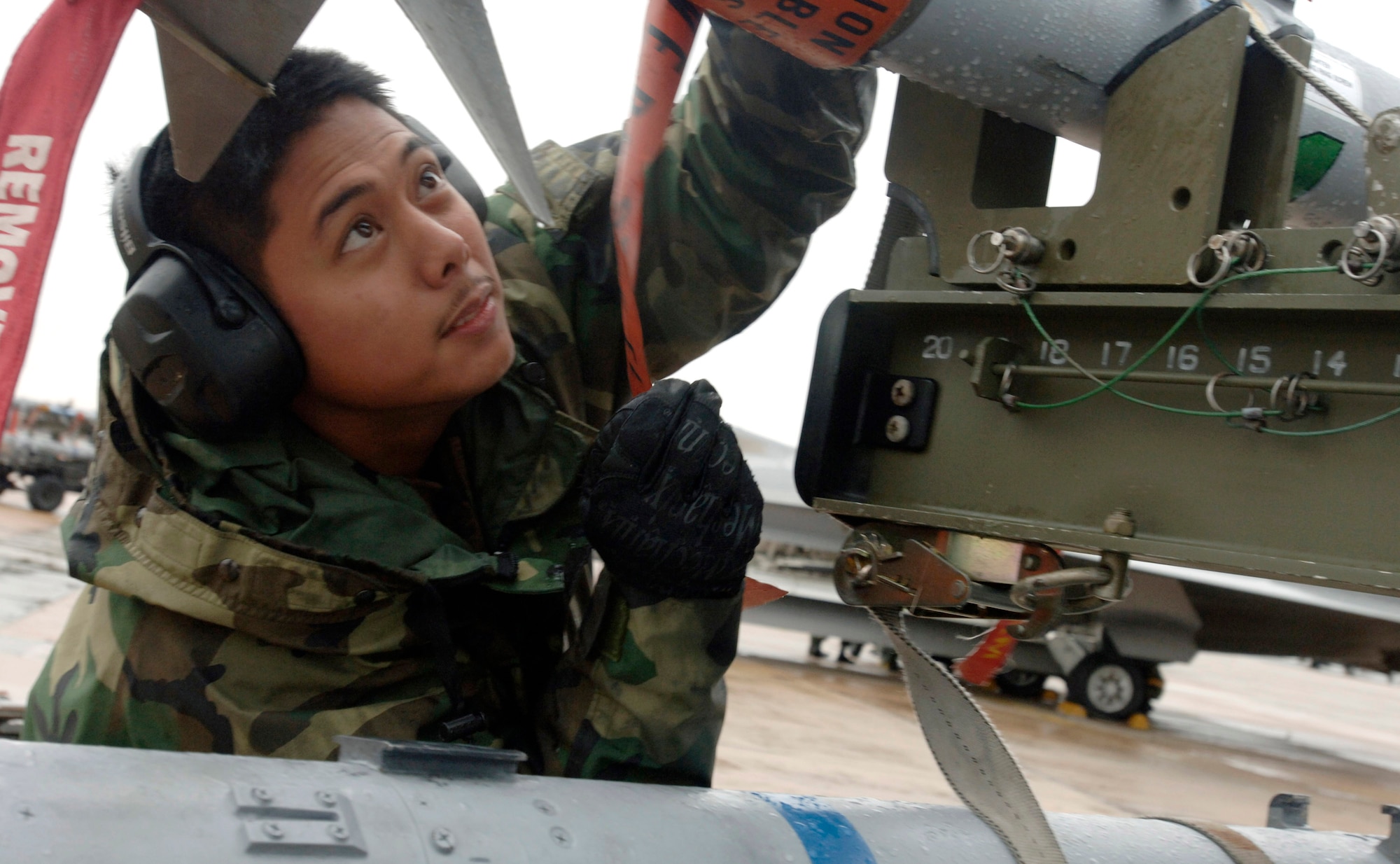 Senior Airman Glenn Dayson inspects ammunition during the Load Competition of the Year Jan. 18 at Langley Air Force Base, Va. The competition evaluates technical proficiency, safety procedures and overall time. Airman Dayson is with the 71st Fighter Squadron. (U.S. Air Force photo/Airman 1st Class Vernon Young) 
