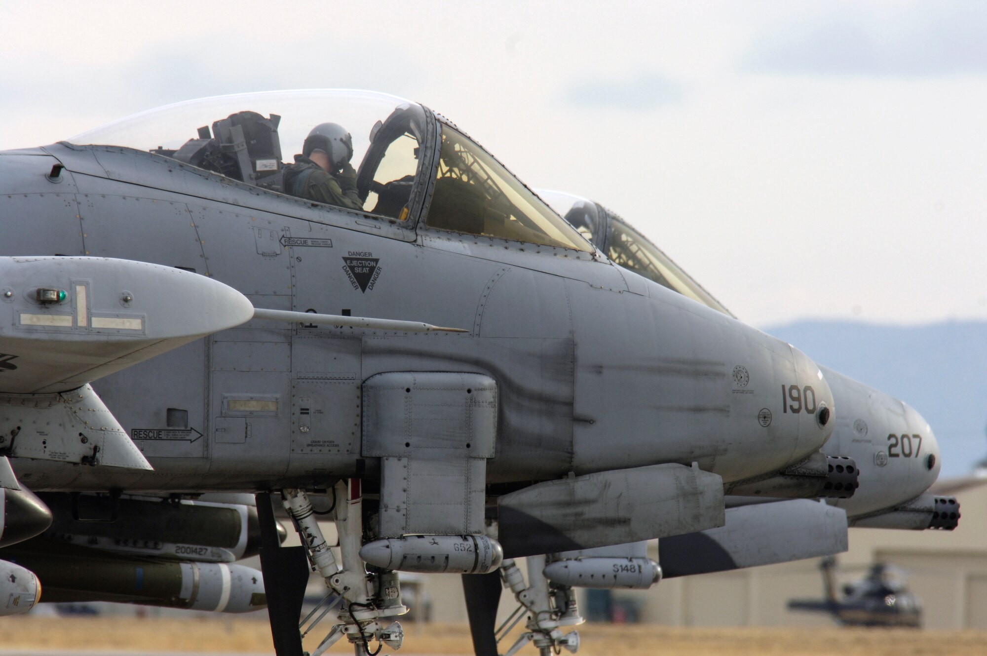 Pilots from the 354th Fighter Squadron prepare to take off in their A-10 Thunderbolt IIs to a simulated deployed location as a part of Bushwhacker 07-02 Jan. 21at Davis-Monthan Air Force Base, Ariz. Bushwacker 07-02 is an operational readiness exercise that tests the 355th Wing's ability to prepare deploy. (U.S. Air Force photo/Senior Airman Jesse Shipps)