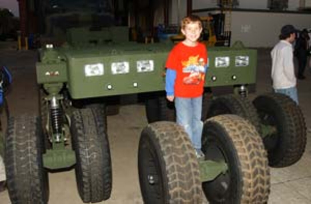 Rico, a military police working dog, barks at nearby person. Rico is one of several dogs from Marine Corps Air Station Beaufort that helps protect Parris Island.