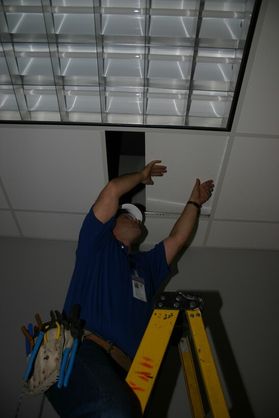 Mark Parker, a construction worker with the Boeing Co., runs conduit in the ceiling of the F-22 facility in preparation for its use in 2008. The $20.5 million structure will be a focal point for all F-22 maintenance training in the Air Force. (U.S. Air Force photo/Staff Sgt. Tonnette Thompson)