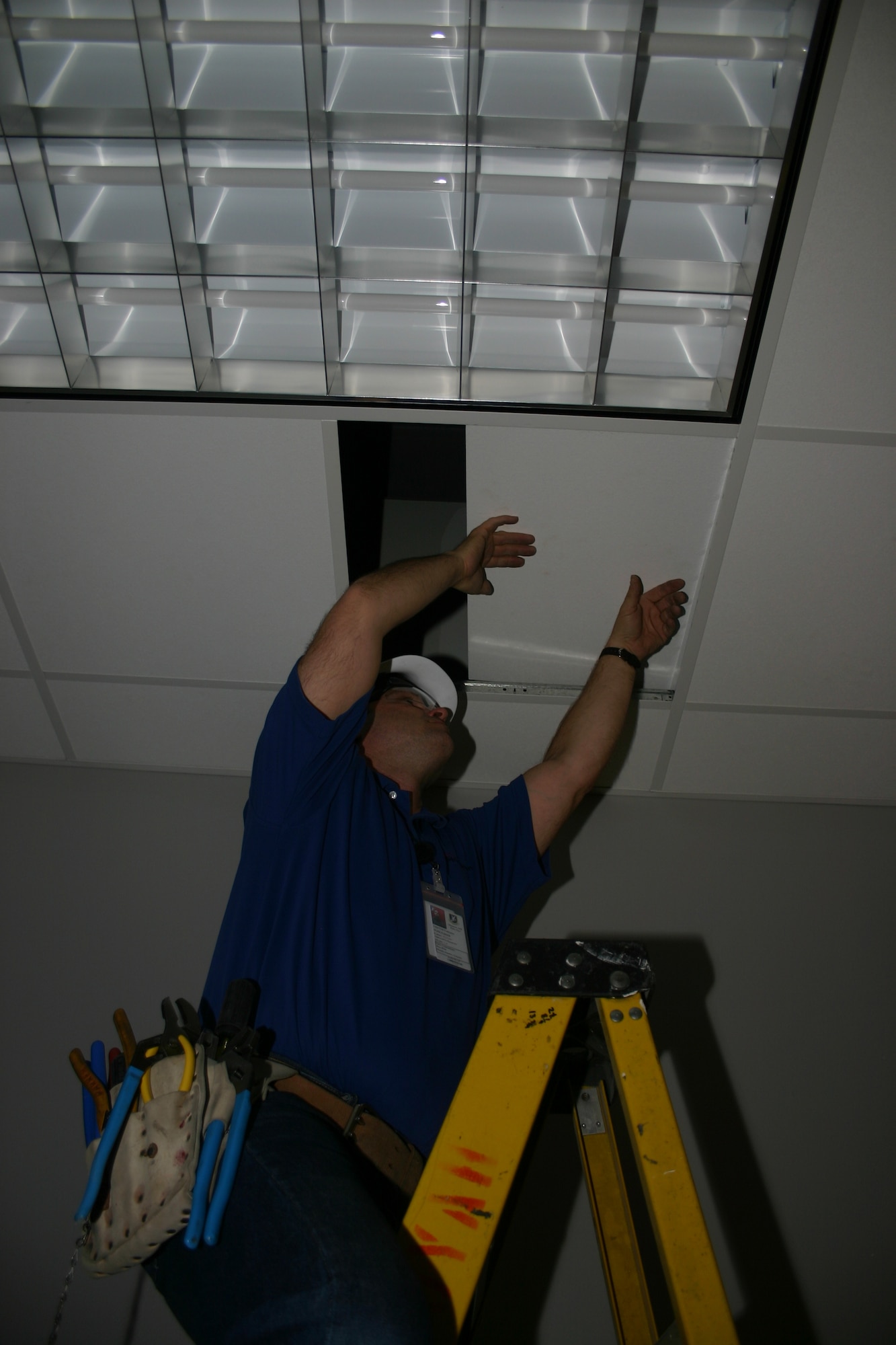Mark Parker, a construction worker with the Boeing Co., runs conduit in the ceiling of the F-22 facility in preparation for its use in 2008. The $20.5 million structure will be a focal point for all F-22 maintenance training in the Air Force. (U.S. Air Force photo/Staff Sgt. Tonnette Thompson)