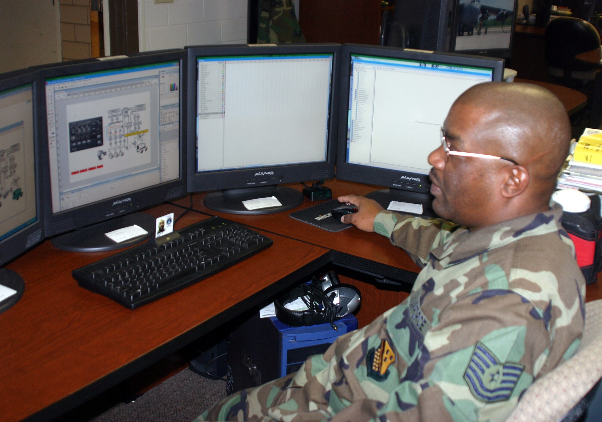Tech. Sgt. Felton Joshua, 982nd Maitenance Squadron training support flight, works on a computer simulated training aid Jan. 19. The 982nd MXS TSF is able to create a wide array of computer simulations to aid technical training instructors. (U.S. Air Force photo/Airman 1st Class Jacob Corbin.)