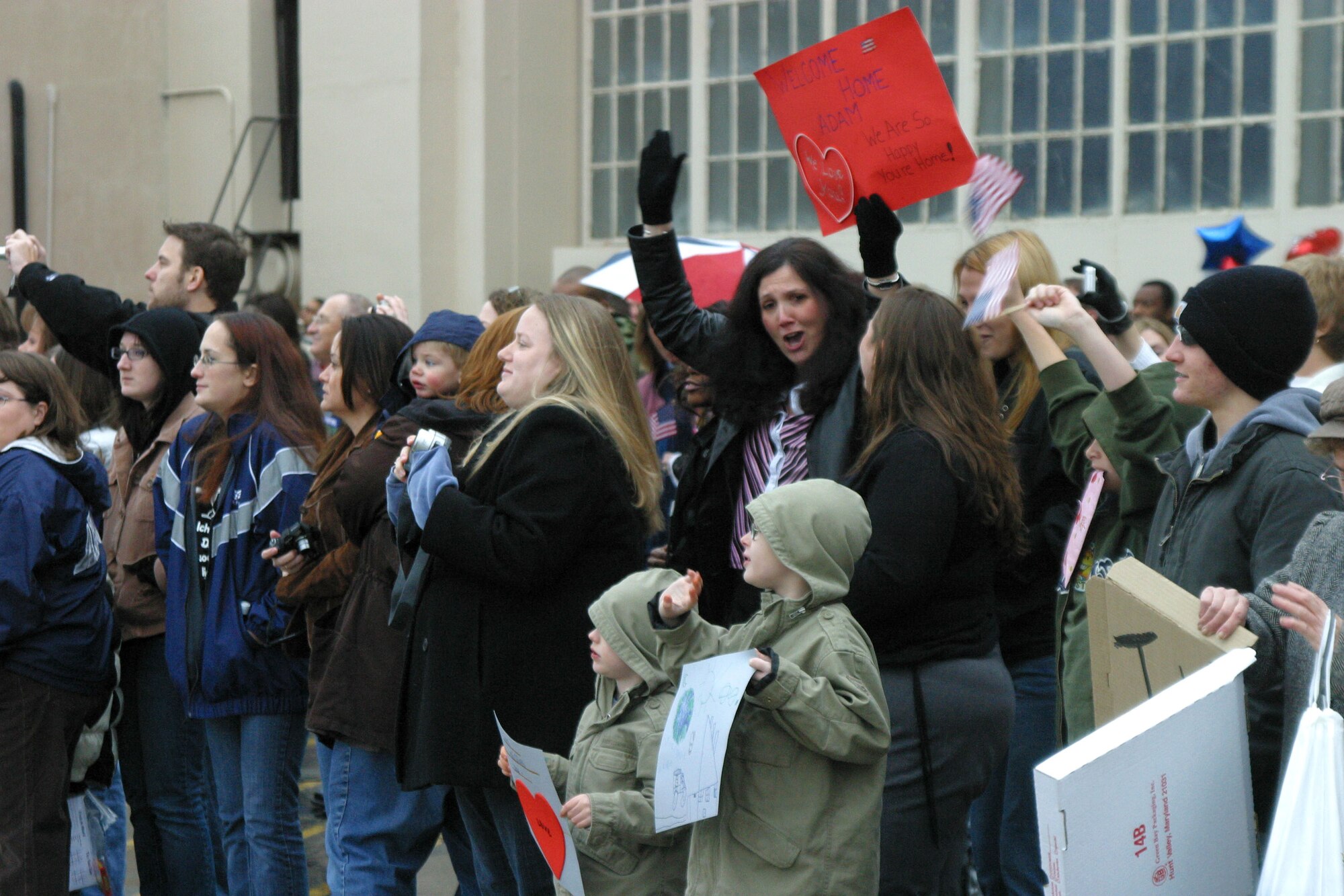 Family members of the 23rd Fighter Group wait for their Airmen to return from a four-month deployment to Afghanistan Jan. 21 at Pope Air Force Base, N.C. (U.S. Air Force photo/Staff Sgt. Cassandra Locke)
