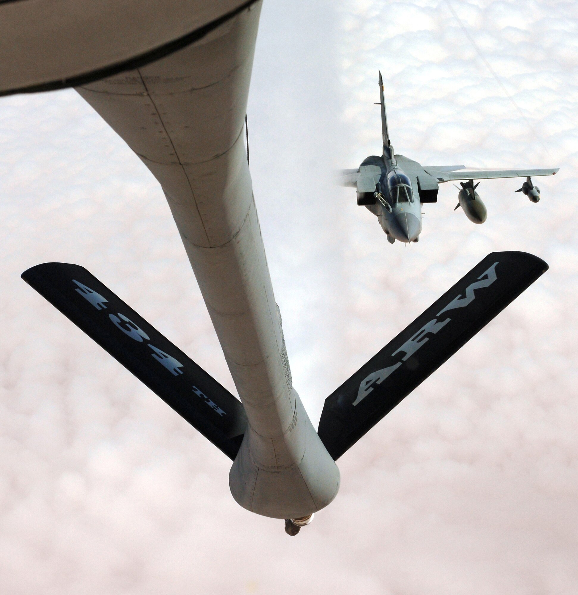 GRISSOM AIR RESERVE BASE, Ind., -- A Royal Air Force Tornado pops out from the contrails  of a Grissom KC-135 as it approaches for a refueling during exerxice Iron Falcon 0701 recently. (U.S. Air Force Photo/Master Sgt. Mike Morgan)
