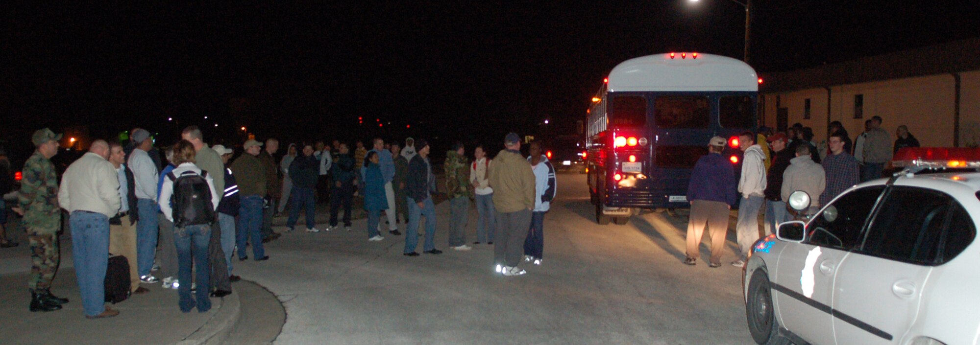 LAUGHLIN AIR FORCE BASE, Texas -- More than 100 people showed up at the Fiesta Center around midnight Jan. 21 to stand in the bitter cold and bid fond farewells to 14 members of Team XL deploying to various bases in Southwest Asia.  (U.S. Air Force photo by Staff Sgt. Austin May)