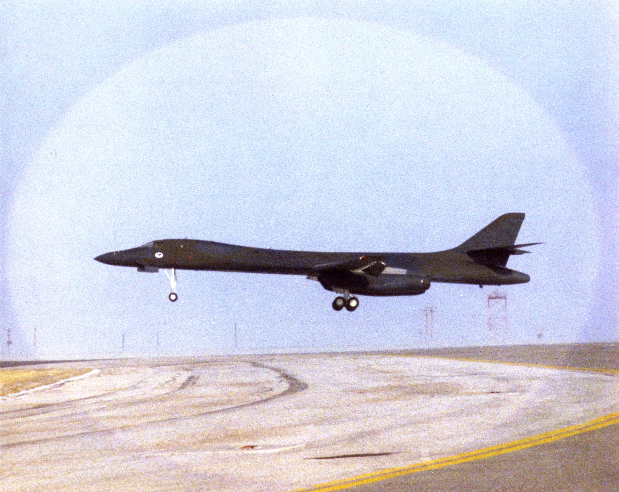 The first B-1B Lancer arrived at Ellsworth Air Force Base, S.D., on Jan. 21, 1987.  The bomber continues to take off from Ellsworth's runway 20 years later.  (U.S. Air Force photo illustration)