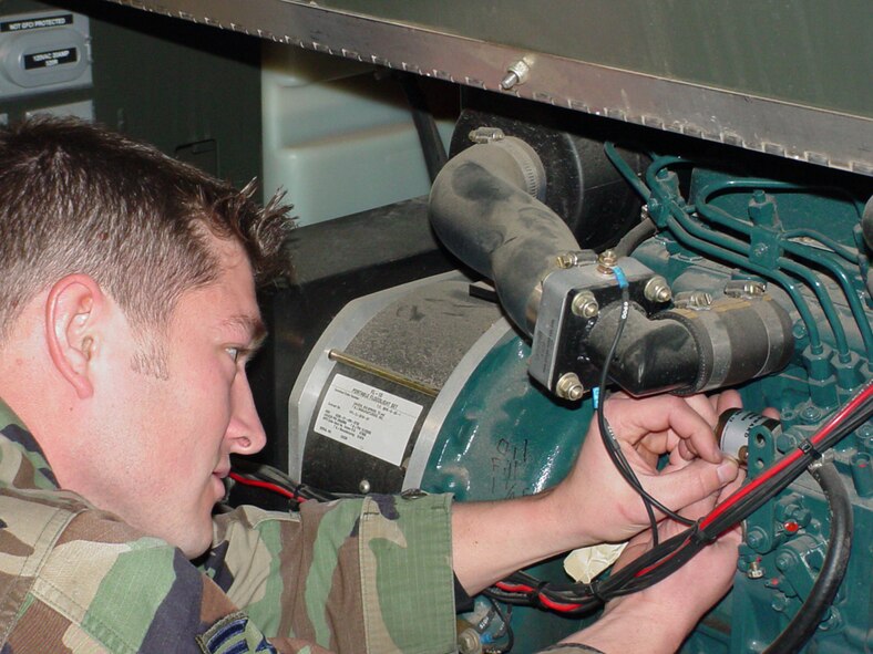 Staff Sgt. Nicholas Weiers, 90th Maintenance Operations Squadron Aerospace Ground Equipment, replaces a fuel shut-off solenoid on a light cart here recently.  The AGE shop excelled during the Missile Standardization Evaluation and Training inspection in December, garnering a professional team award for zero discrepancies.