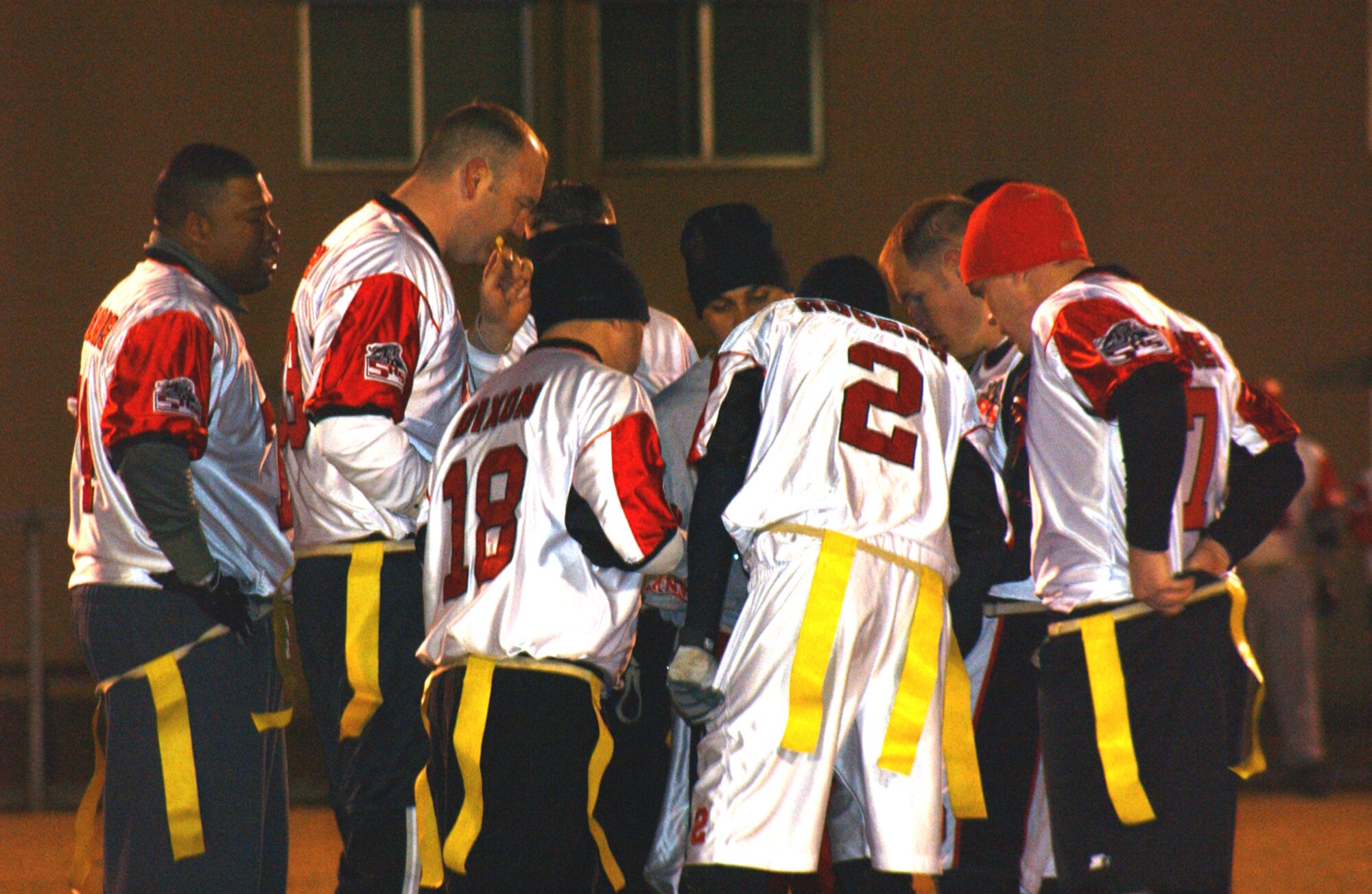 OSAN AIR BASE, Republic of Korea --  The 5th Reconnaissance Squadron’s intramural flag football team huddles to prepare for the next play. (U.S. Air Force photo by Senior Airman Eunique Stevens)