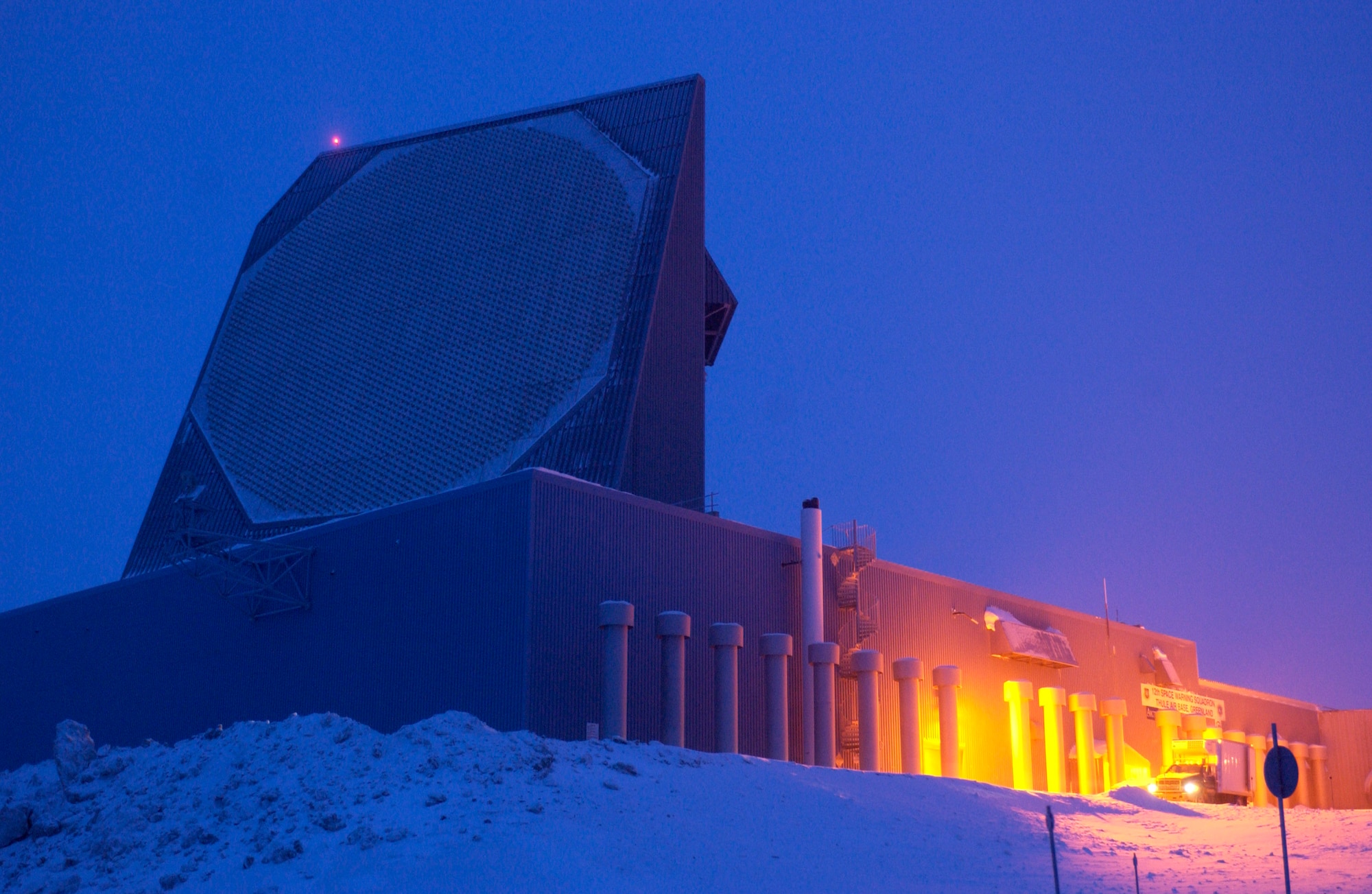 One of the two radar faces of the Ballistic Missile Early Warning System, or BMEWS, site is captured using time-lapsed photography to show the minimal amount of available light during twilight Jan. 25 at Thule Air Base, Greenland. (U.S. Air Force photo/Michael Tolzmann) 
