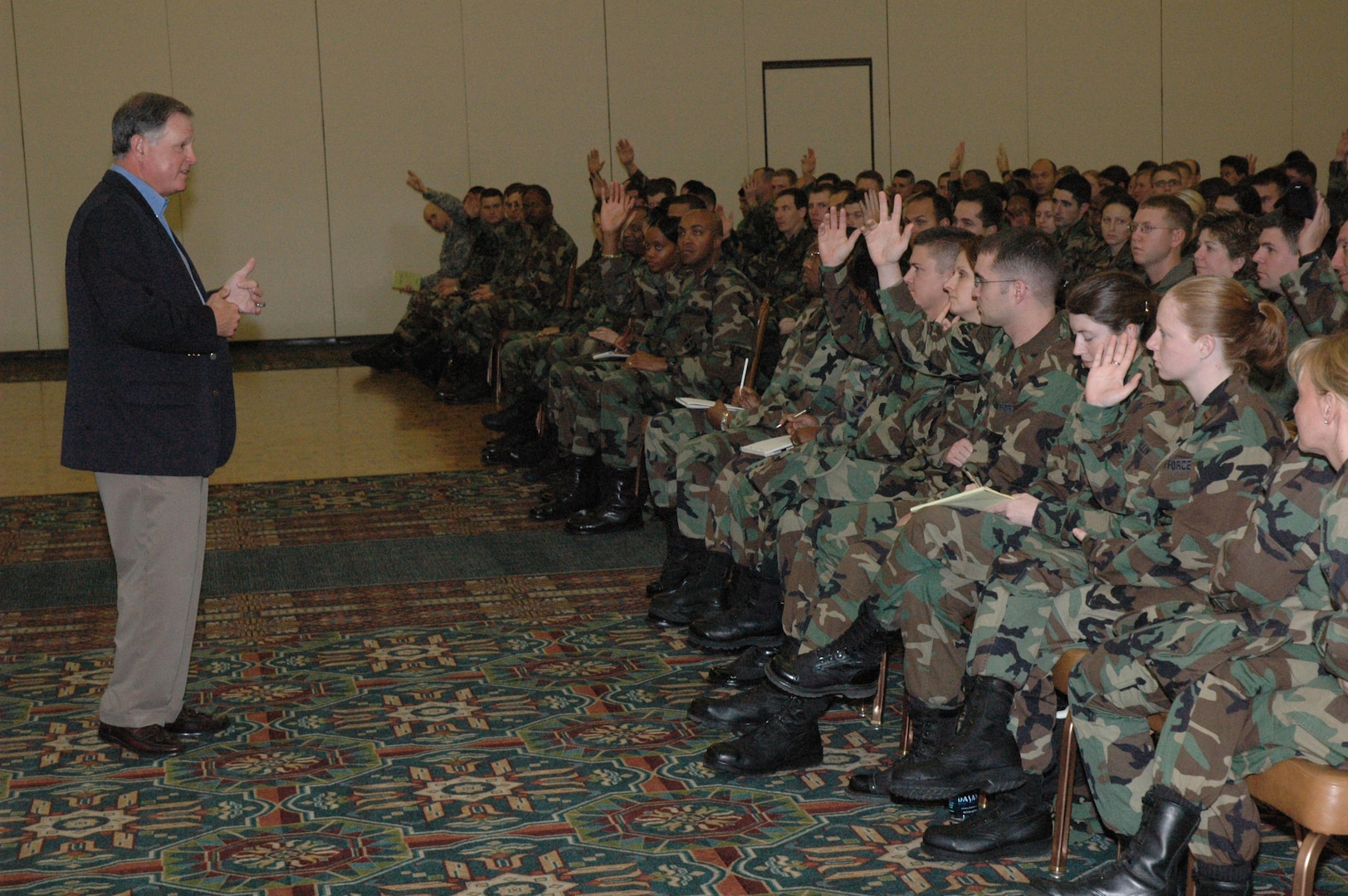 Steven Polk, a retired lieutenant general, spoke to the 37th Training Wing's company grade officers Jan. 11 at the Gateway Club on Lackland Air Force Base, Texas. Mr. Polk is the first speaker for the newly instituted monthly CGO professional development sessions. Mr. Polk relayed his ideas about leadership and the importance of incorporating one's own personality into his leadership style. (USAF photo by Lt. Col. Daniel Epright)