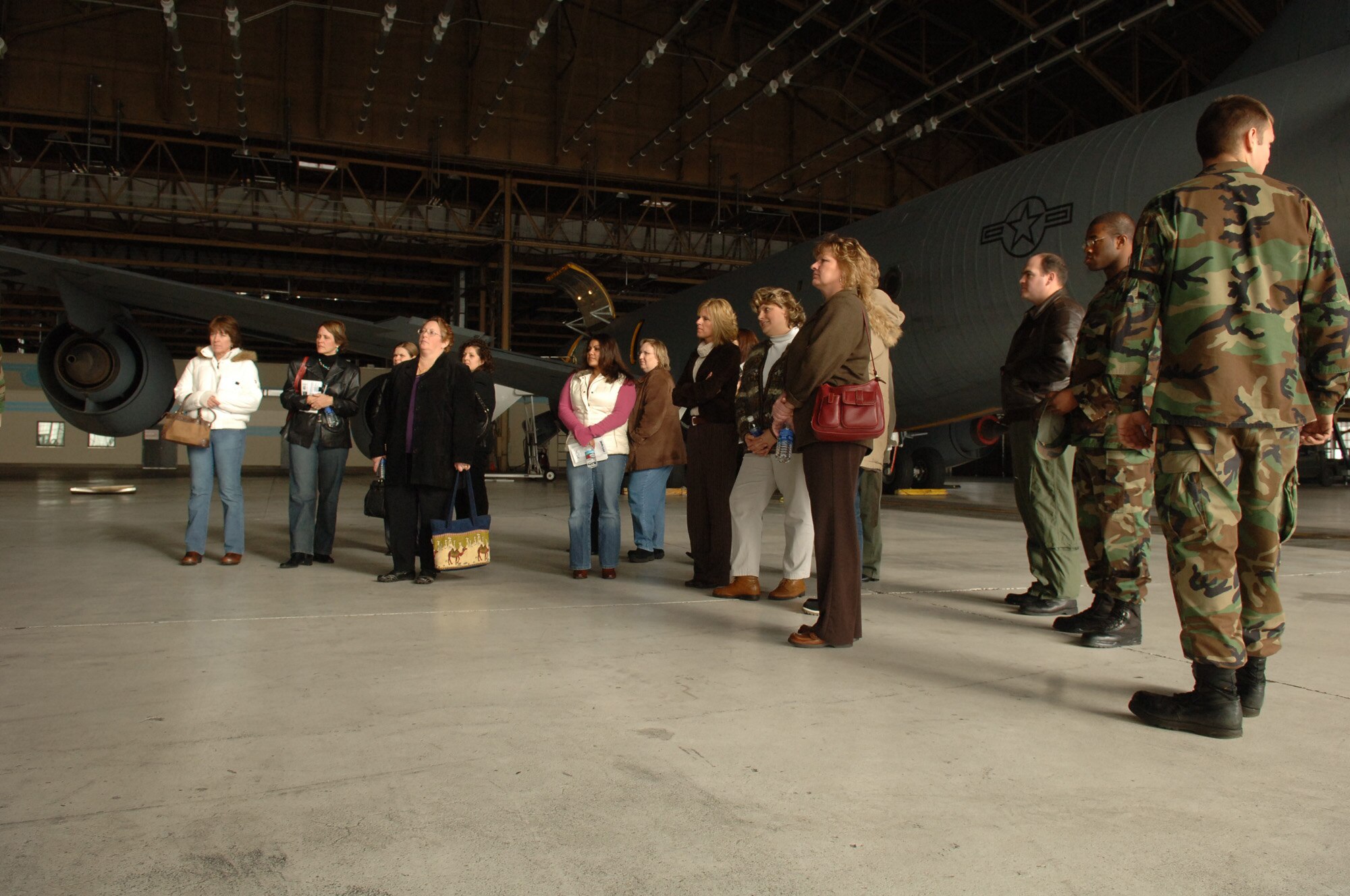 Military spouses learn more about the KC-135 Stratotanker as part of the spouse's orientation tour provided by the 92nd Mission Support Group Jan. 24. The orientation is to help spouses of military members get familiar with Fairchild and its opportunities.  