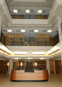 The view from the three-story atrium from allows one an unobstructed view from the charge of quarters desk to the ceiling. (USAF photo by Alan Boedeker)                               