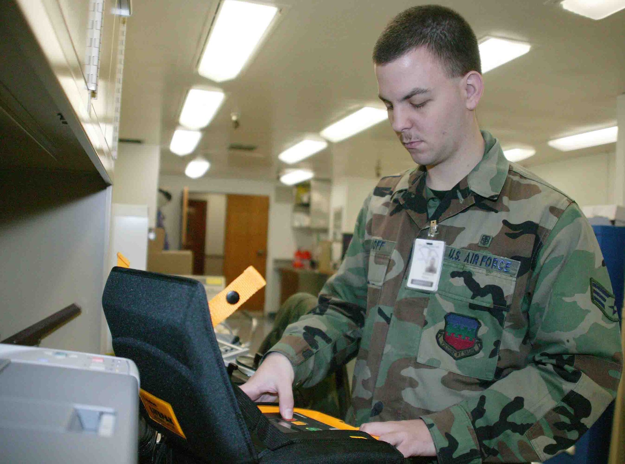 SHAW AIR FORCE BASE, S.C. -- Senior Airman Kevin Eftemoff, 20th Medical Support Squadron biomedical equipment technician, performs a test on an AED defibrillator. (U.S. Air Force photo/Senior Airman John Gordinier)