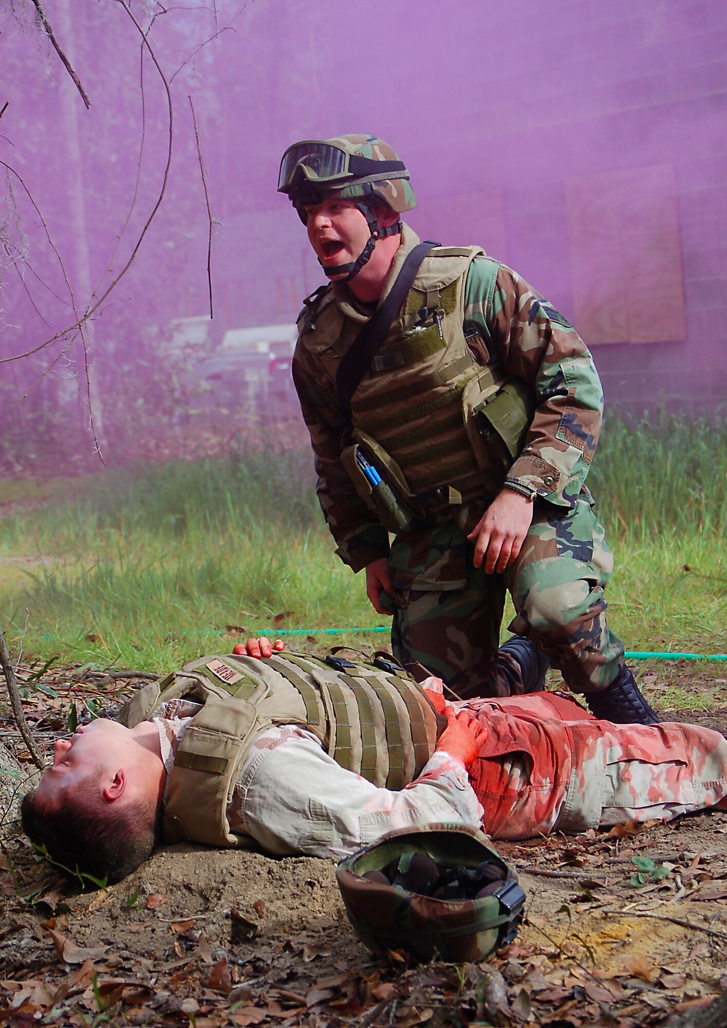 Airman 1st Class Evan Due, 823rd Security forces fire team member, provides first aid to a mock casualty during a combat medical skills excercise held Jan. 19 Moody Air Force Base, Ga. (U.S. Air Force photo by Tech. Sgt. Parker Gyokeres)