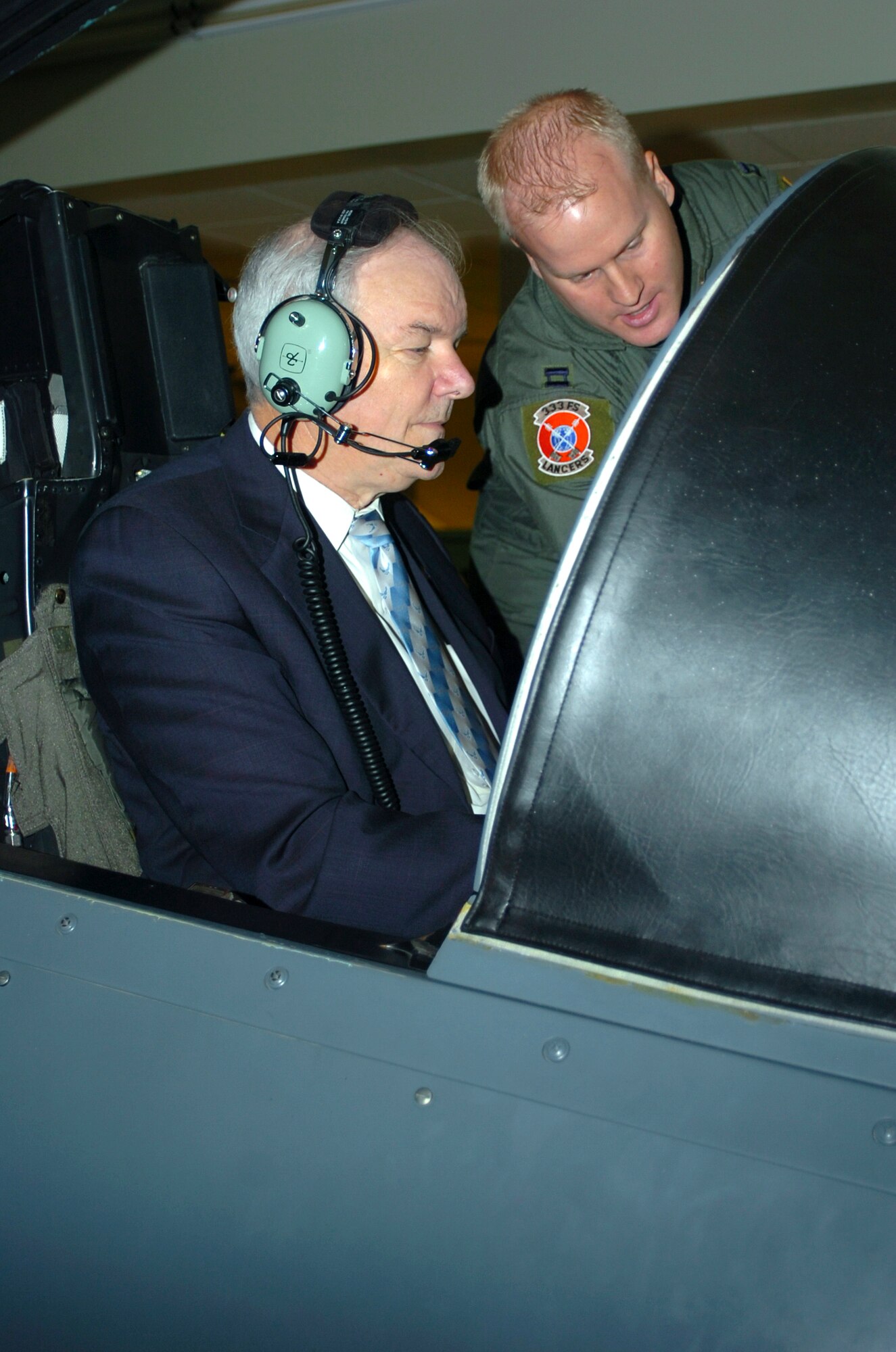 Secretary of the Air Force Michael W. Wynne gets a chance to "fly" an F-15E Strike Eagle in a 4th Fighter Wing simulator Jan. 19 during his visit to Seymour Johnson Air Force Base, N.C.  (U.S. Air Force photo/Airman 1st Class Greg Biondo)