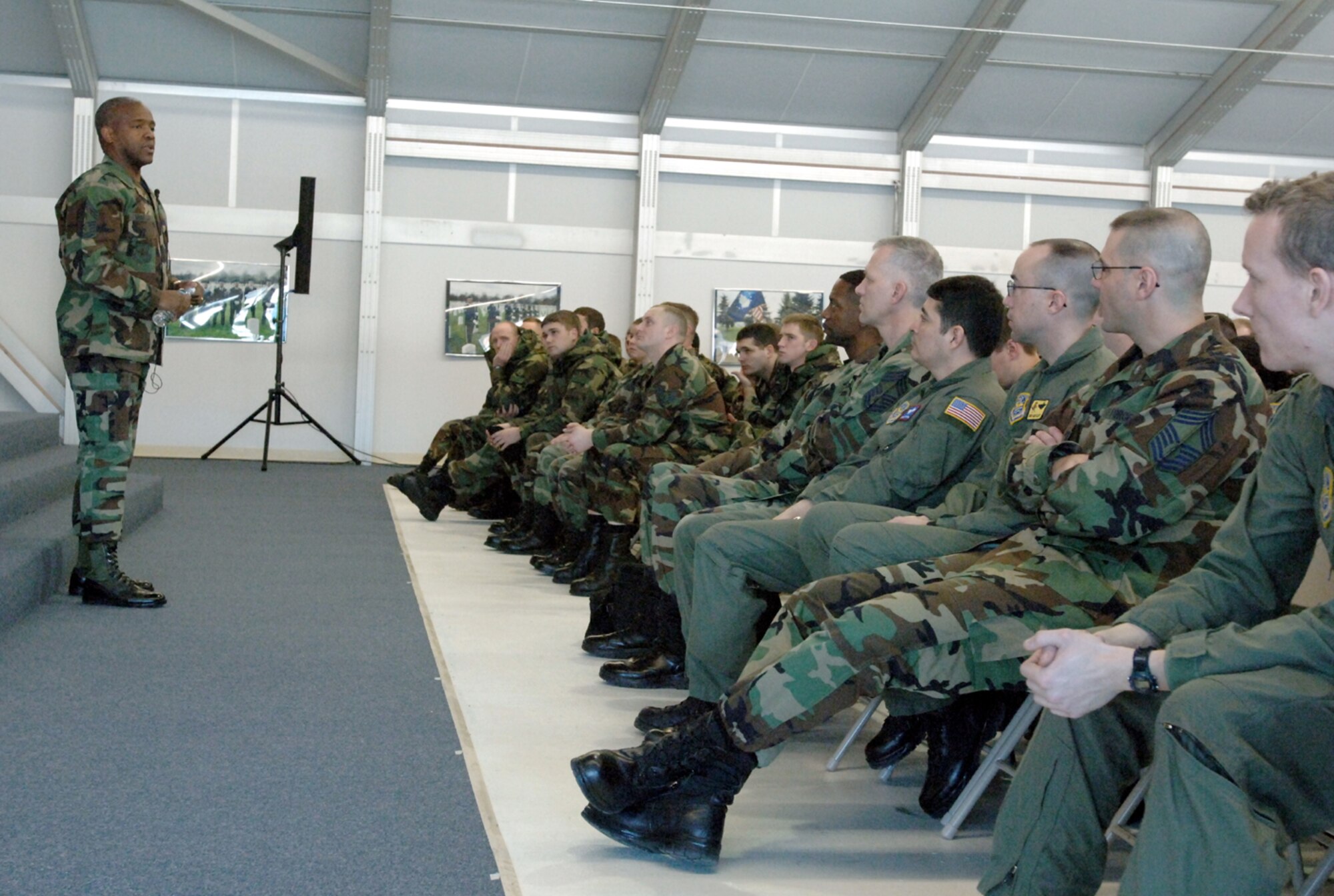 GRAND FORKS AFB, N.D. -- Chief Master Sgt. Brye McMillon, 18th Air Force command chief master sergeant, speaks go Airmen here Jan. 25 about changes in the Air Force and why we must revamp. (photo/Airman 1st Class SerMae Lampkin)