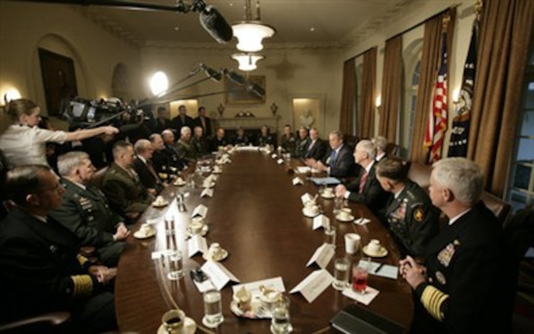 President George W. Bush addresses members of the media prior to meeting with the Joint Chiefs of Staff and Combatant Commanders in the Cabinet Room at the White House, Jan. 24,  2007. Bush said  "it's an honor to be in the presence of such fine citizens, men who are doing their duty to protect this country."