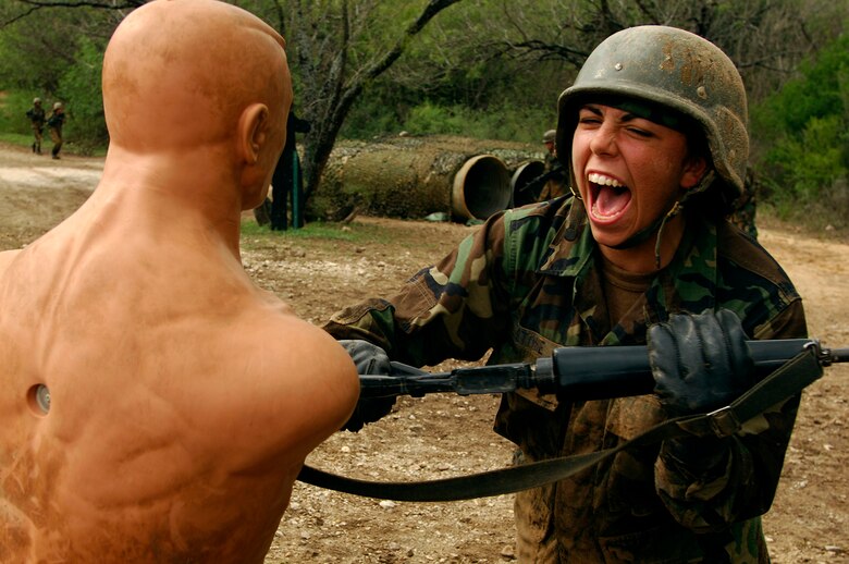 Using a practice dummy, Airmen learn they don't need to shoot their rifles to inflict pain with them.