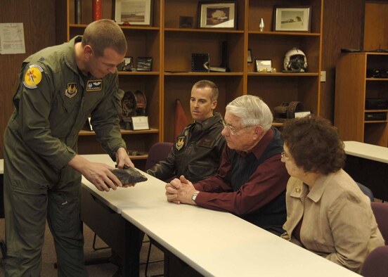 Lt. Col. Duncan Dversdall,  846th Test Squadron commander, discusses the semantics of the Speed Test Track equipment to Retired Chief Master Sgt. of the Air Force Robert Gaylor and his wife, Selma, and Lt. Col Allan Elledge, 46th Test Group deputy commander. Chief Gaylor is the guest Speaker for the 46 TG Annual Awards Ceremony. (U.S. Air Force photo by Staff Sgt. Lakisha Croley)