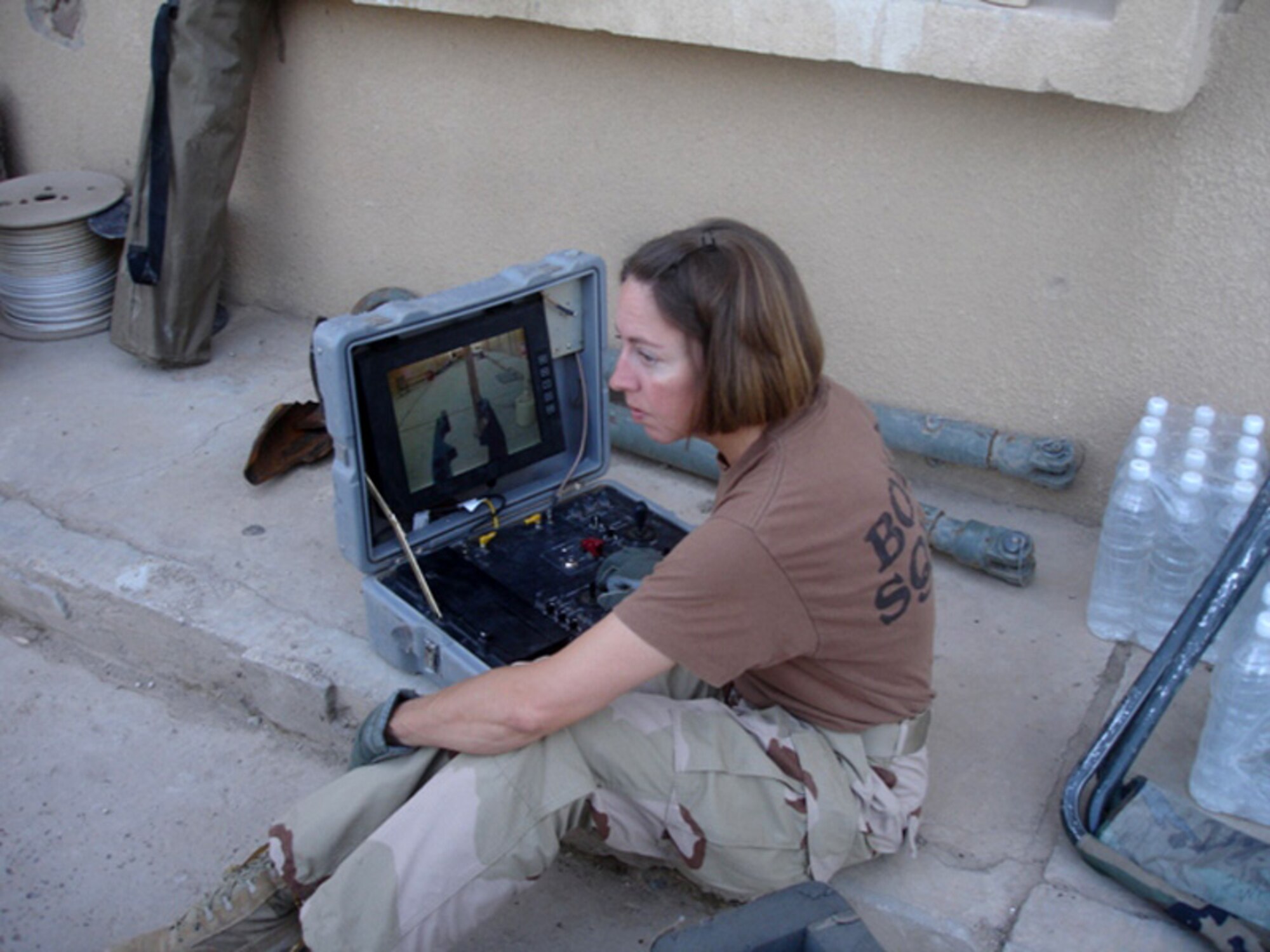 Tech. Sgt. Michelle Barefield, an explosive ordnance disposal specialist shown here conducting an operations check for a remote-controlled robot, was invited to attend the State of the Union address Jan. 23 as a guest of the president.  She was one of five military members, one from each service, to attend.  Sergeant Barefield is currently deployed to Iraq from Seymour Johnson Air Force Base, N.C.  (U.S. Air Force photo)