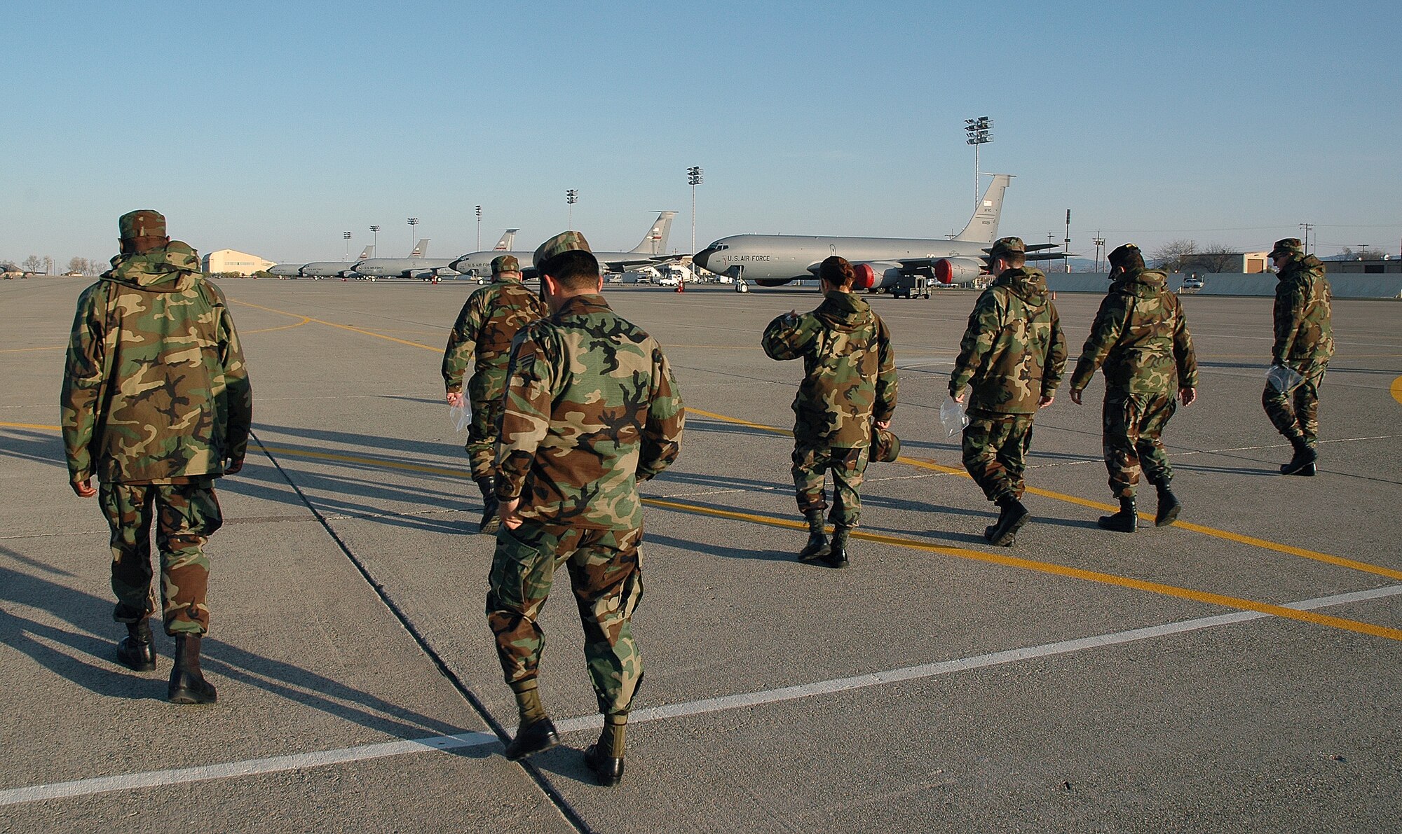 Reservists from the 940th Air Refueling Wing participate in a foreign object debris walk during a unit training assembly weekend at Beale Air Force Base, Calif. on Jan. 7, 2007. FOD walks ensure the flight line is free from any small objects that may cause damage to jet aircraft engines during normal flight operations. (U.S. Air Force Photo/ Staff Sgt. Luke Johnson)