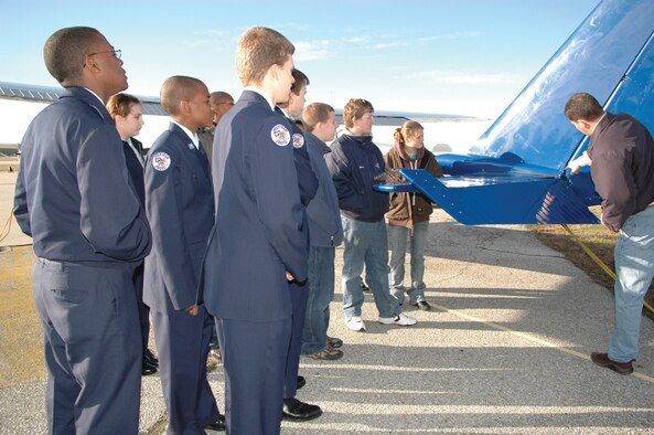 The 512th Public Affairs Office hosted a base tour Jan. 9 to a dozen Polytech High School students who are members of the Junior Reserve Officer Training Program. The group was especially interested in the Aero Club as their high school offers aviation courses. Aero Club opportunities are available to a variety of patrons including ROTC, reservists, base civilians, retirees and more. To see the complete eligibility list, log onto www.doverafbservices.com/leisure_recreation/flight_training.php. The center is approved for flight training and testing under the Federal Aviation Administration, which qualifies for use of Veterans Administration benefits. Located in Building 447, the club's office hours are Monday through Friday from 9 a.m. to 5 p.m., and they are closed on weekends and holidays. For more information, call (302) 677-6365. (U.S. Air Force photo/Tech. Sgt. Veronica A. Aceveda)