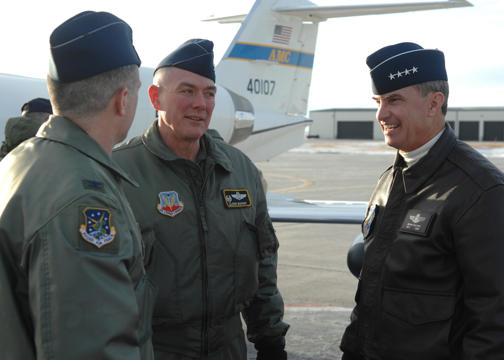 MINOT AIR FORCE BASE, N.D. – From right to left: Gen. Kevin P. Chilton, Air Force Space Command commander, speaks to Col. Eldon Woodie, 5th Bomb Wing commander, and Col. Marty Whelan, 91st Space Wing commander, upon his arrival here Jan. 23. General Chilton visited Minot AFB as part of a base orientation to familiarize him with the wings now under his command. (U.S. Air Force photo by Airman 1st Class Christopher Boitz)