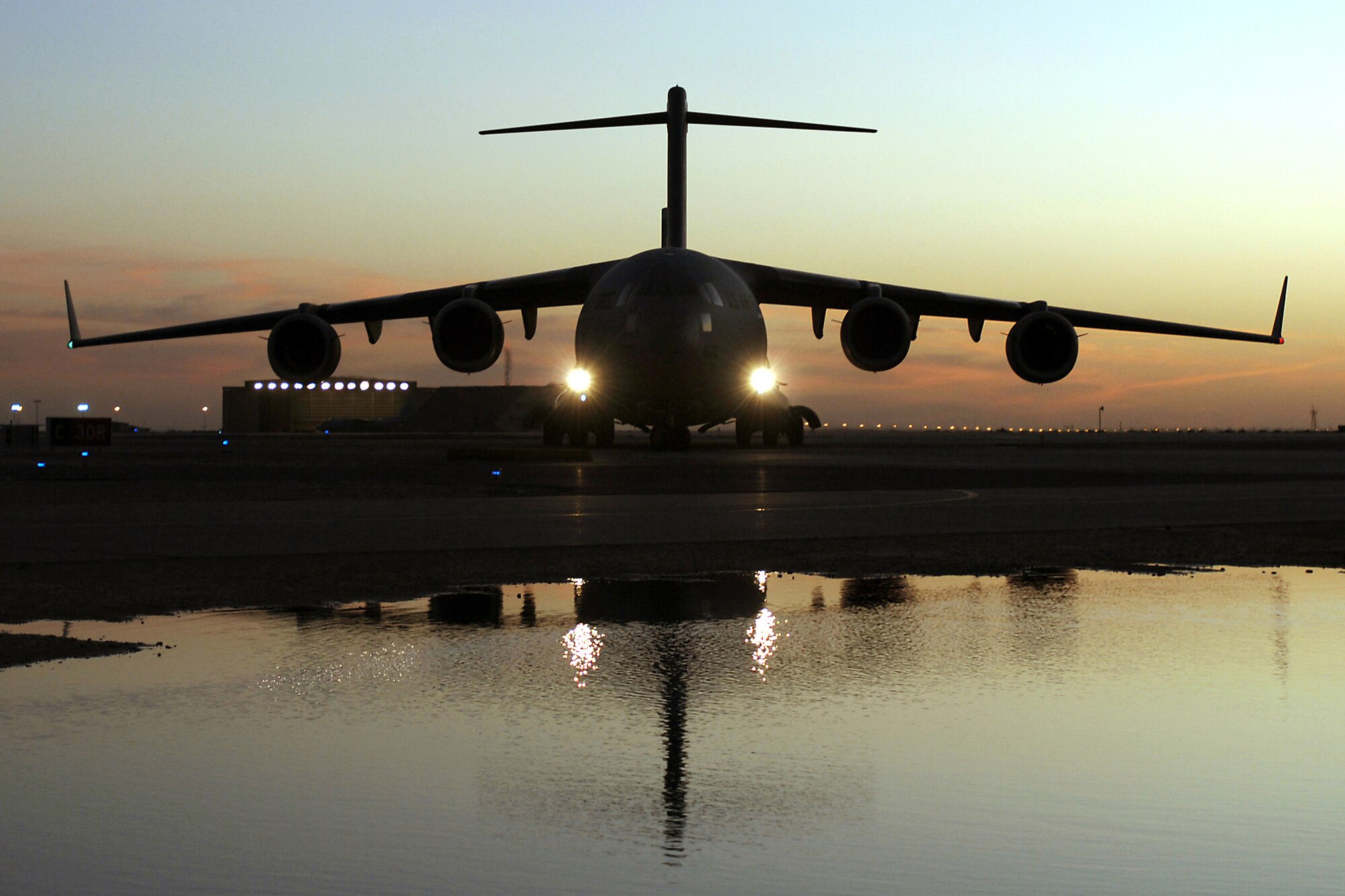 A C-17 Globemaster III prepares to take off Jan. 17 from an undisclosed location in Southwest Asia. (U.S. Air Force photo/Staff Sgt. Edward D. Holzapfel)
