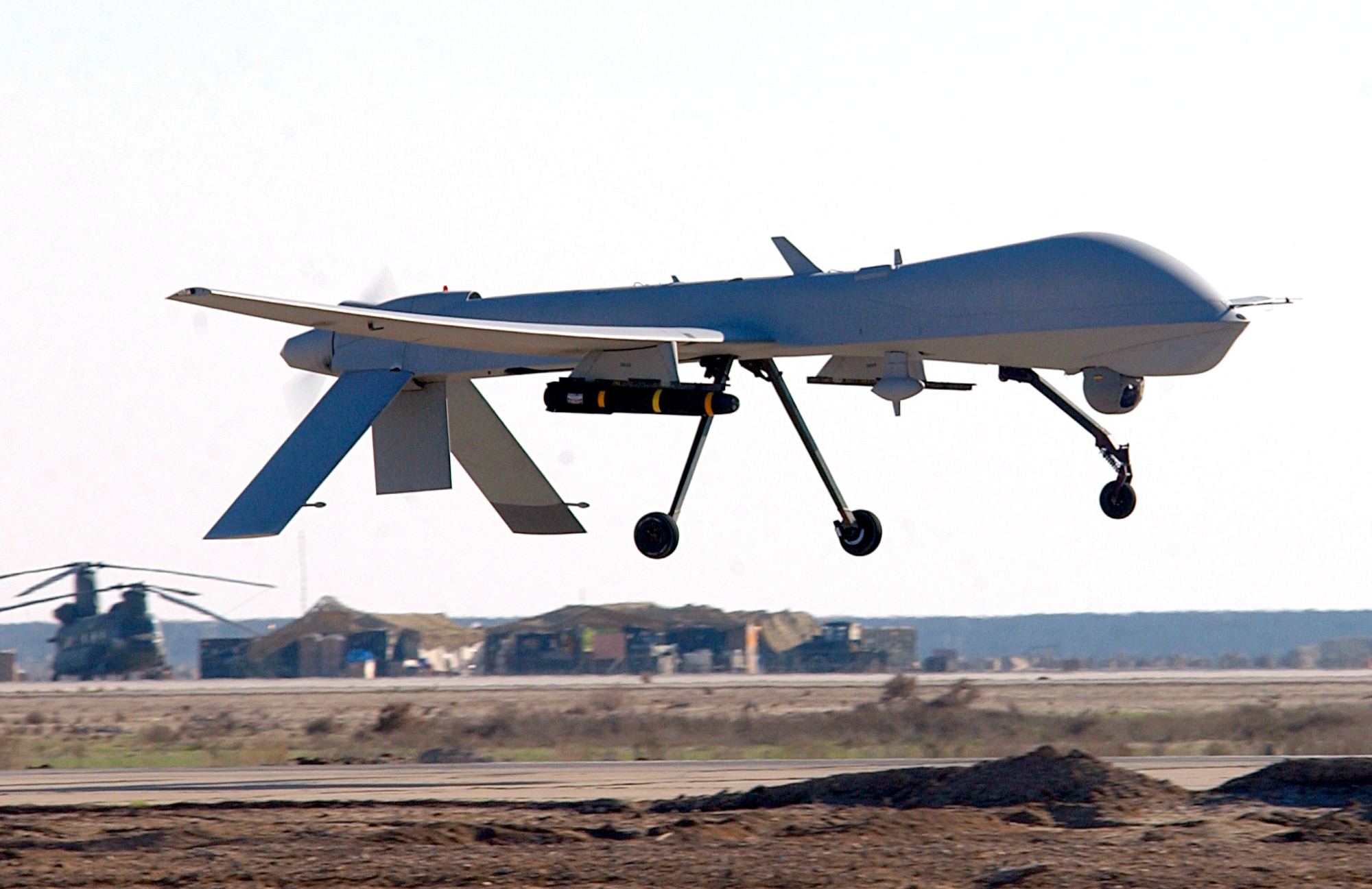 An MQ-1 Predator unmanned aerial vehicle from the 46th Expeditionary Reconnaissance Squadron lands Jan. 20 at Tallil Air Base, Iraq. The Predator is a remotely piloted vehicle that provides real-time surveillance imagery supporting the war on terrorism. (U.S. Air Force photo/Staff Sgt. Suzanne M. Jenkins)
