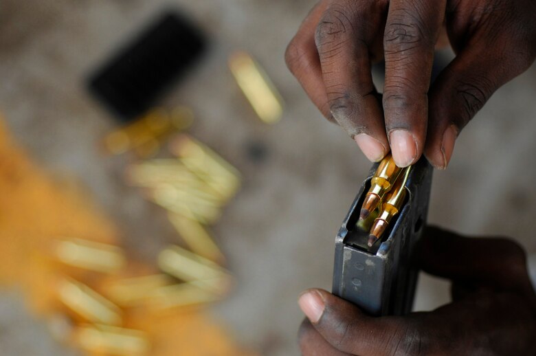 Basic trainees shoot nearly 50 rounds and fill several magazines with ammunition during live-fire qualification training at the range.