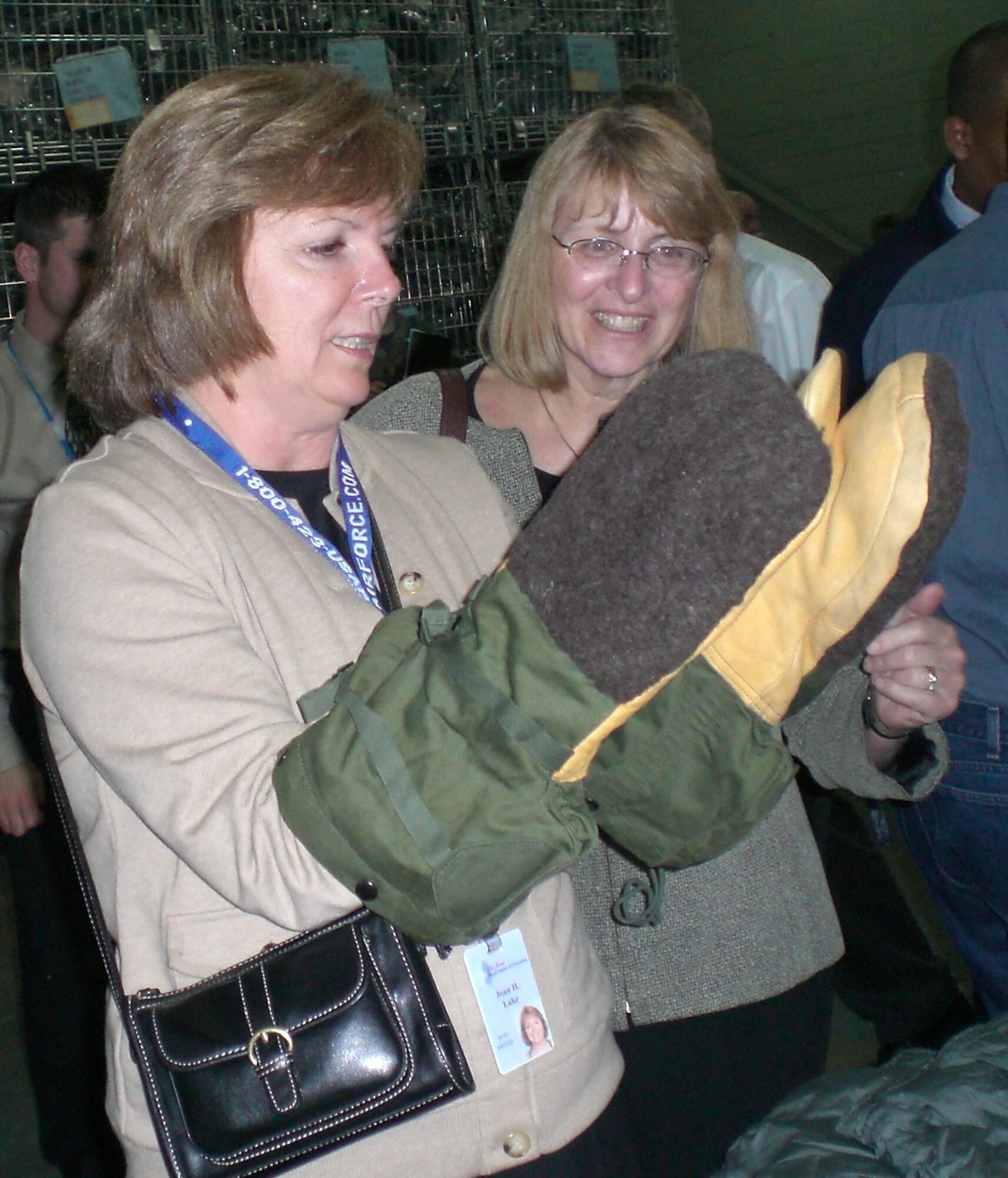 Educators examine various pieces of Air Force mobility equipment.  Educators visited McGuire Nov. 29 to learn about the Air Force and its mission. U.S. Air Force photo by Senior Airman Dilia DeGrego