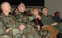 MINOT AIR FORCE BASE, N.D. - (from left) Chief Master Sgt. Mark Brejcha, 91st Space Wing command chief, Chief Master Sgt. Michael Sullivan, Air Force Space Command command chief, Sue Whelan and husband Col. Marty Whelan, 91st Space Wing commander, attended AFSPC Commander Gen. Kevin Chilton's first commander's call held here Jan 23. Chief Sullivan visited with base Airmen and later shared his focus on being deployment ready. (U.S. Air Force photo by Airman 1st Class Christopher Boitz) 