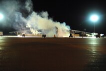MINOT AIR FORCE BASE, N.D. -- A B-52H Stratofortress fires up its engines on the flightline here before daybreak Jan. 30. The B-52’s engines are being tested to measure the difference between JP-8 fuel, which the B-52 is accustomed to, and Fischer-Tropsch, a new synthetic fuel. The testing of synthetic fuel in cold weather is the last step in the certification process to help reduce Air Force dependence on imported fuel. With added wind chill, Minot Air Force Base experienced temperatures of minus 25 F on this day.