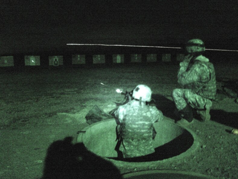 A Rakkasan fires his M4 Carbine during nightfire at the Arnold AFB Rifle Range. (U.S. Air Force photo)
