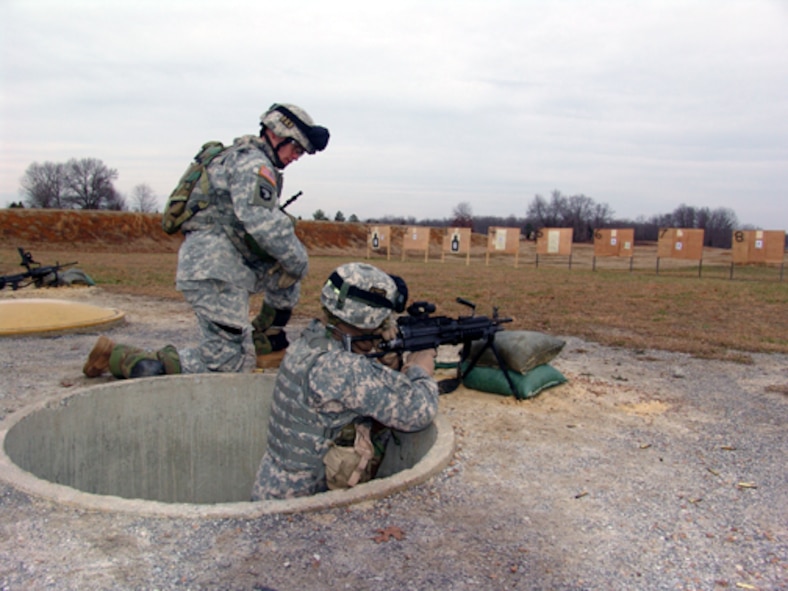 A 101st Airborne Division solider fires his squad automatic weapon on the base range. (U.S. Air Force photo)