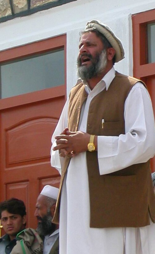 Sayeed Rahman, sub-governor of Pachir wa Agam district in Afghanistan's Nangarhar province, speaks at the official reopening ceremony of Agam High School on March 25. The 2nd Battalion, 3rd Marine Regiment, funded the school's rehabilitation with $25,000 in Commander's Emergency Response Program funds. Photo by Capt. Dan Huvane, USMC
