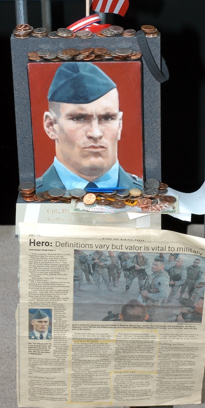 Probably the most famous portrait of the fallen is former National Football League star Pat Tillman, 27, who gave up the glamorous life of a professional football star to join the Army Rangers. He was killed in Afghanistan on April 22, 2004. Natasha Mokina painted his portrait at the "Faces of the Fallen" exhibit on display at the Women in Military Service to America Memorial in Arlington, Va.. Photo by Rudi Williams