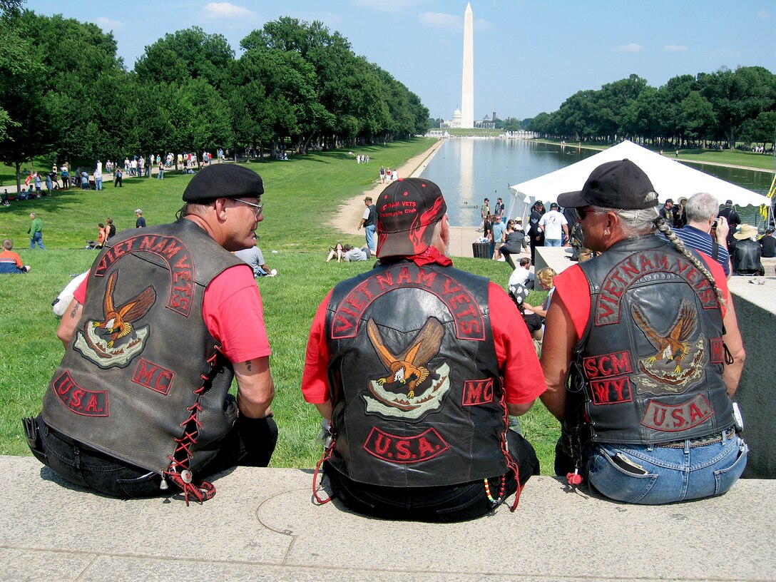 Three Vietnam veterans listen to the speakers at the Rolling Thunder XIX Ride for Freedom at the National Mall in Washington, D.C., May 28. Photo by Sgt. Sara Wood, USA