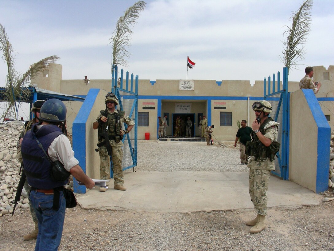 Soldiers from the Multinational Division Central-South stand at the entrance to Fort Tarik on the Iran-Iraq border. The Iraqi outpost helps secure the often contentious border. Photo by Jim Garamone