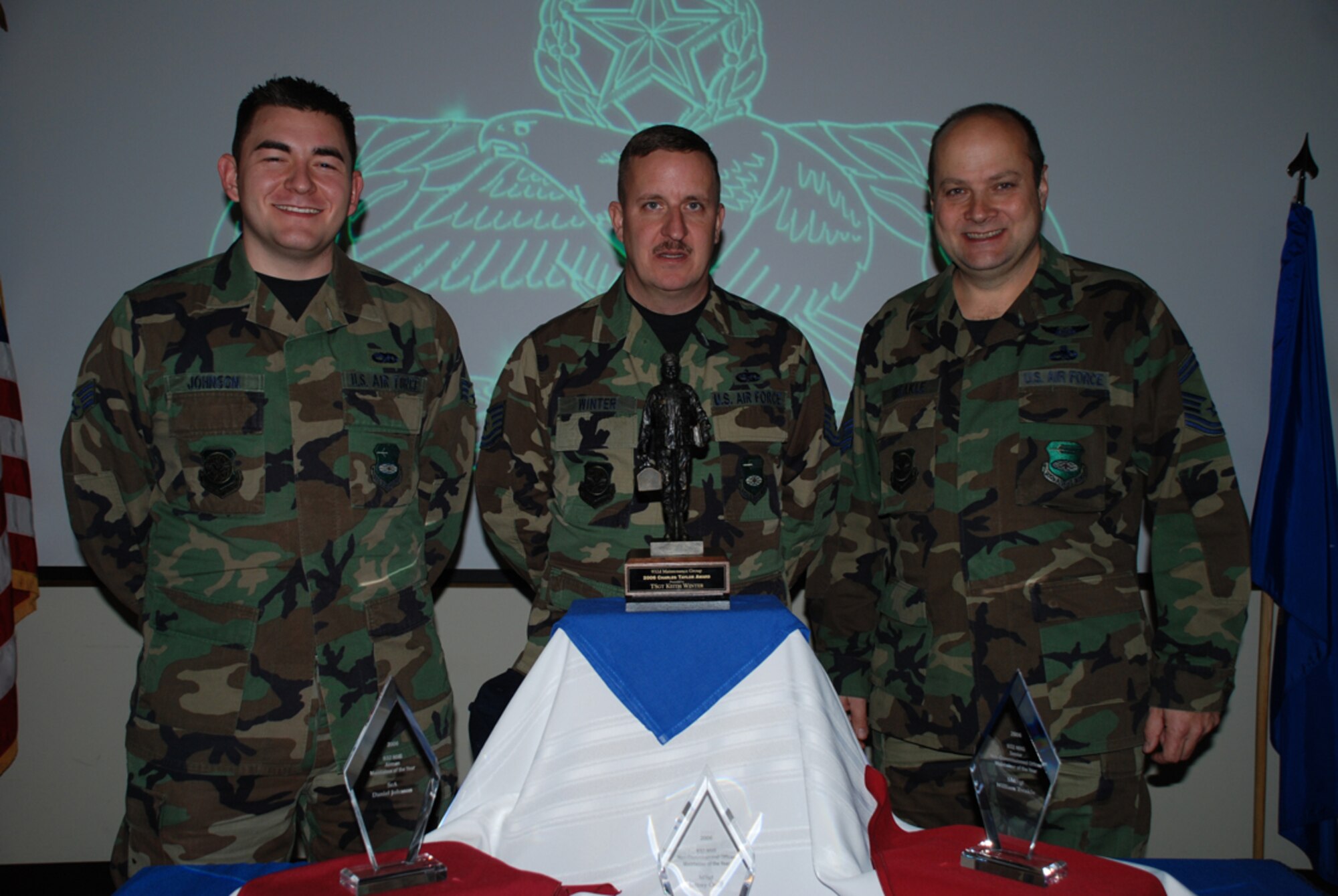 The winners of the first annual Charles Taylor awards ceremony honoring members with outstanding performance:  Airman Category – Senior Airman Daniel Johnson; Noncommissioned Officer – Master Sgt. Jeff Craig; Senior Noncommissioned – Senior Master Sgt. William Treakle.  Photo/Tech Sgt. Dan Oliver