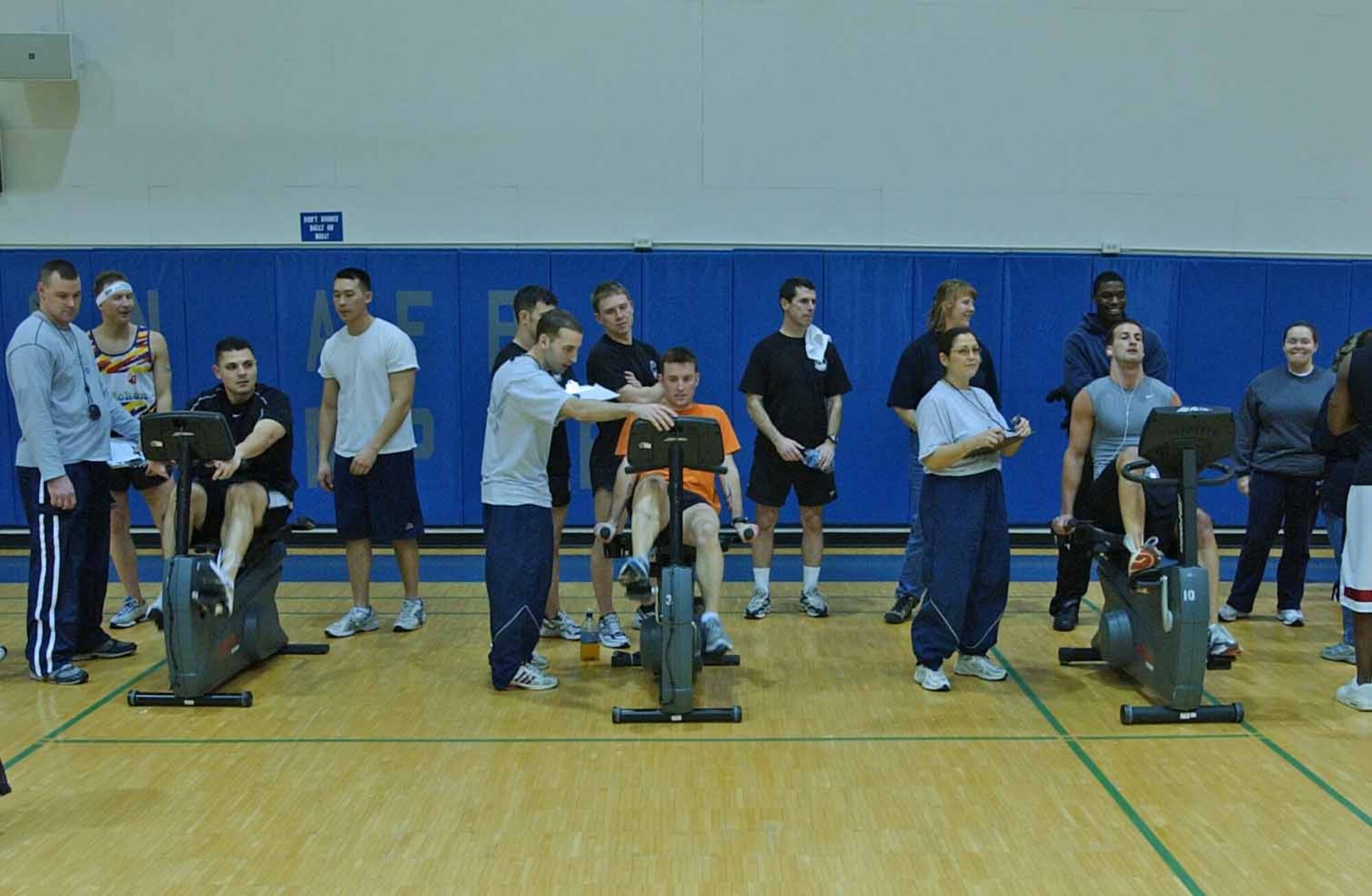 EIELSON AIR FORCE BASE, Alaska--Airmen compete in a stationary bike race during a four-person team competition featuring unique challenges. The 354th Communications Squadron team took the $400 first place prize. More than 400 Airmen and their families attended the X-Treme Winter Challenge hosted by the 354th Services Squadron and BASE 24/7. (U.S. Air Force phot by Senior Airman Justin Weaver)                        
